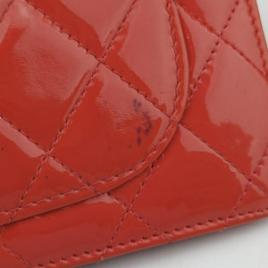 Pre-owned Chanel Quilted CC logo Orange Patent A31509 long-wallet | stylenewstar