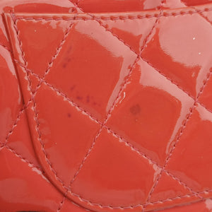 Pre-owned Chanel Quilted CC logo Orange Patent A31509 long-wallet | stylenewstar