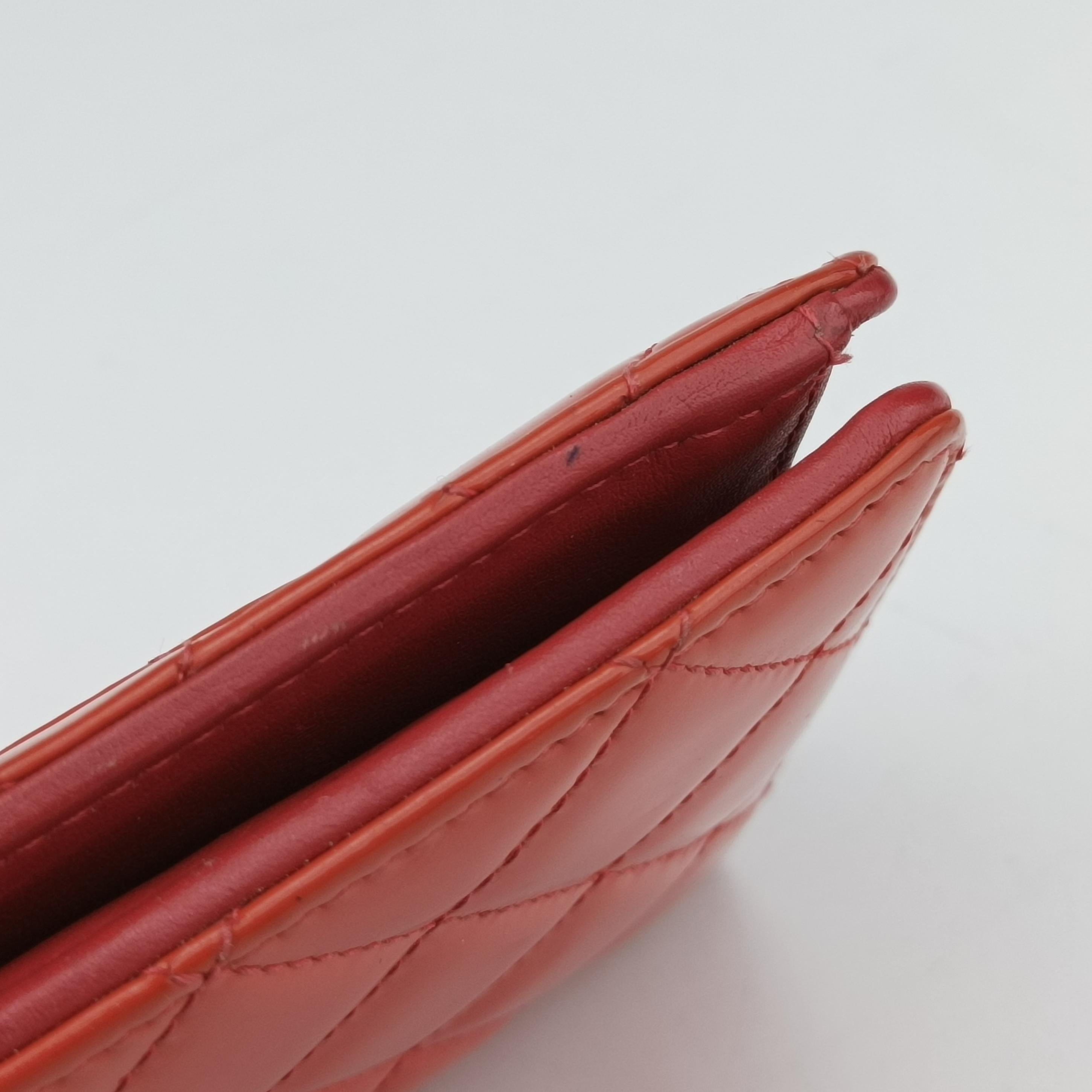 Pre-owned Chanel Quilted CC logo Orange Patent A31509 long-wallet | stylenewstar