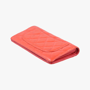 Pre-owned Chanel Quilted CC logo Orange Patent A31509 long-wallet | stylenewstar