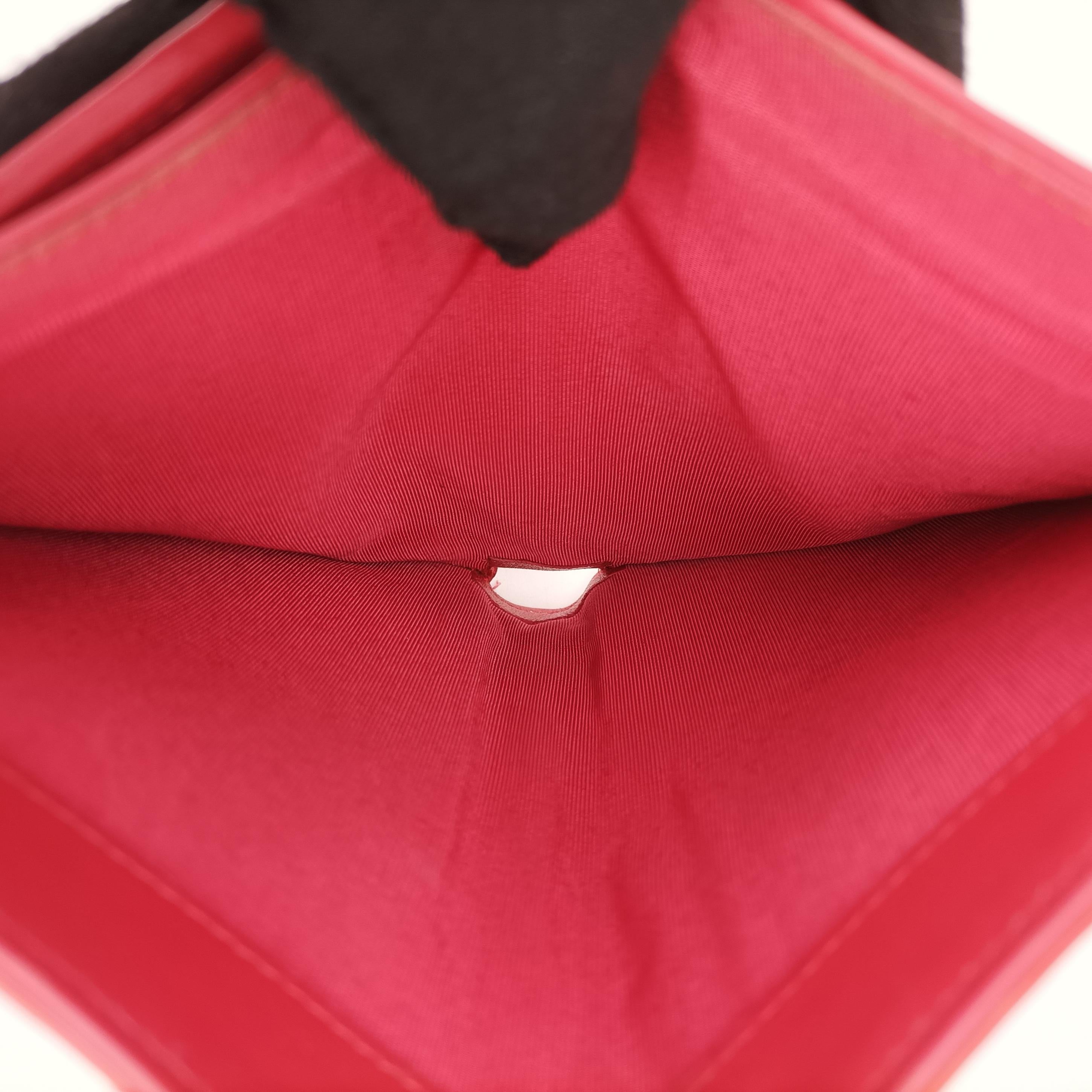 Pre-owned Chanel Quilted CC logo Orange Patent A31509 long-wallet | stylenewstar