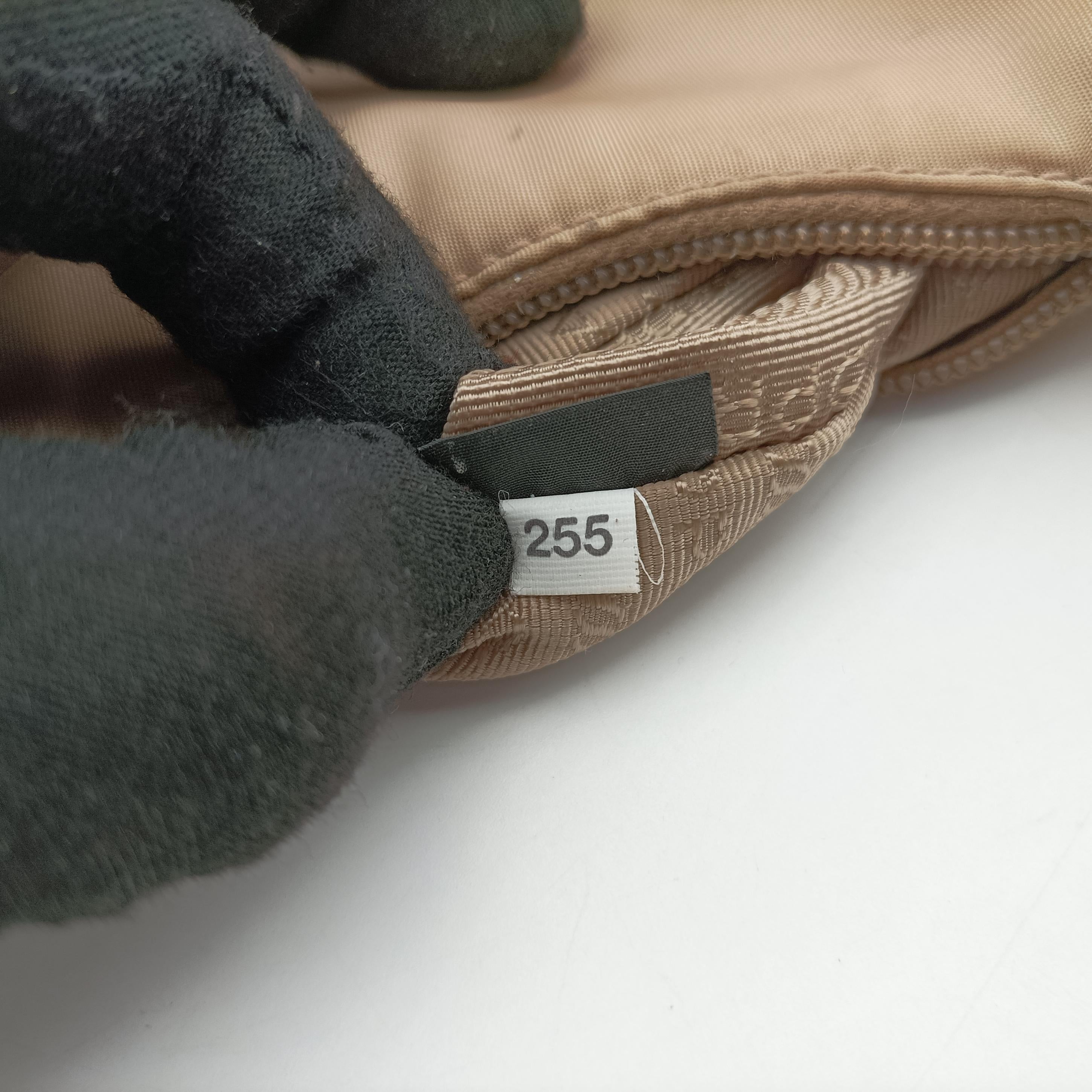 Pre-owned Prada Re-Edition 2005 Re-Nylon Bag Beige nylon 1BH204 handbag | stylenewstar