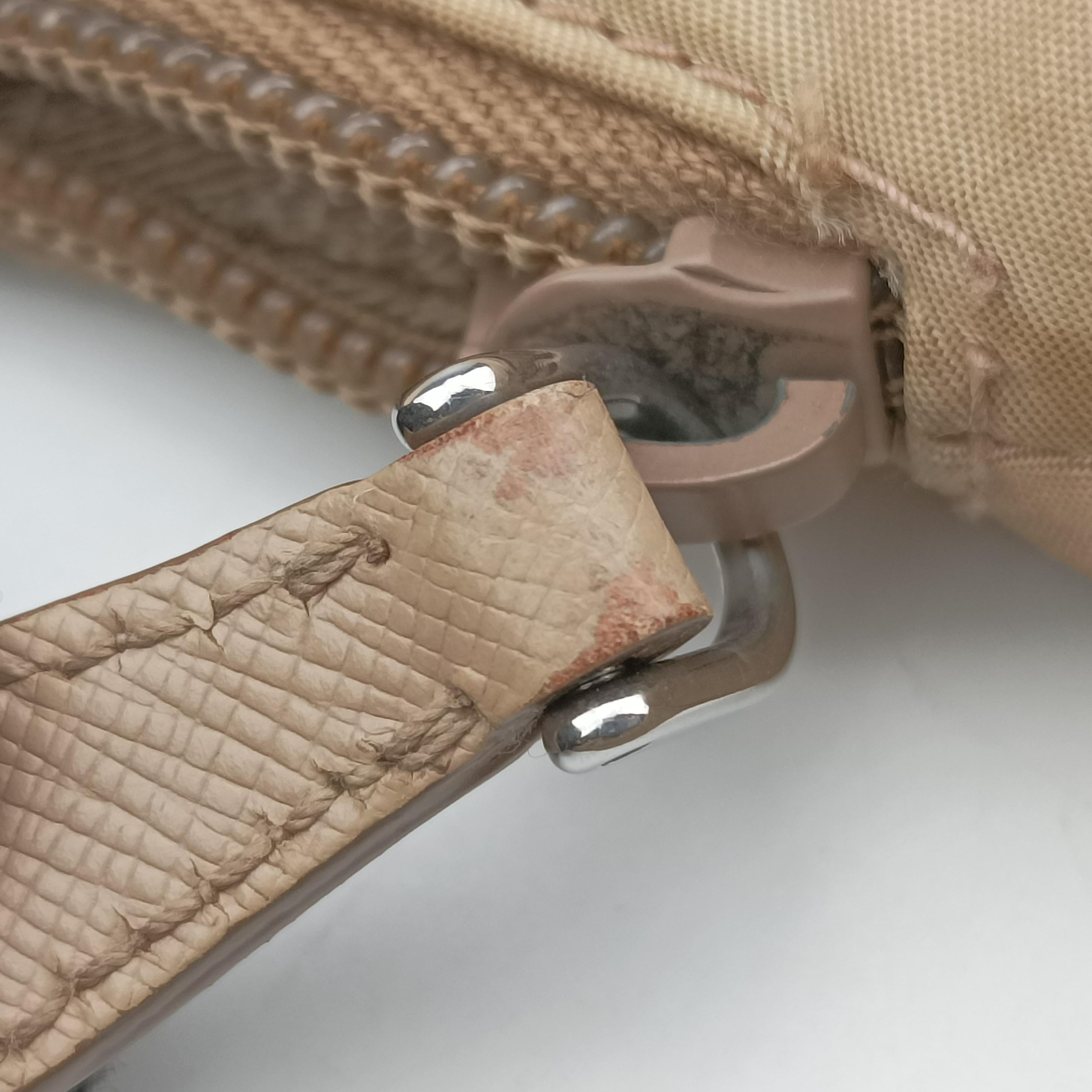 Pre-owned Prada Re-Edition 2005 Re-Nylon Bag Beige nylon 1BH204 handbag | stylenewstar