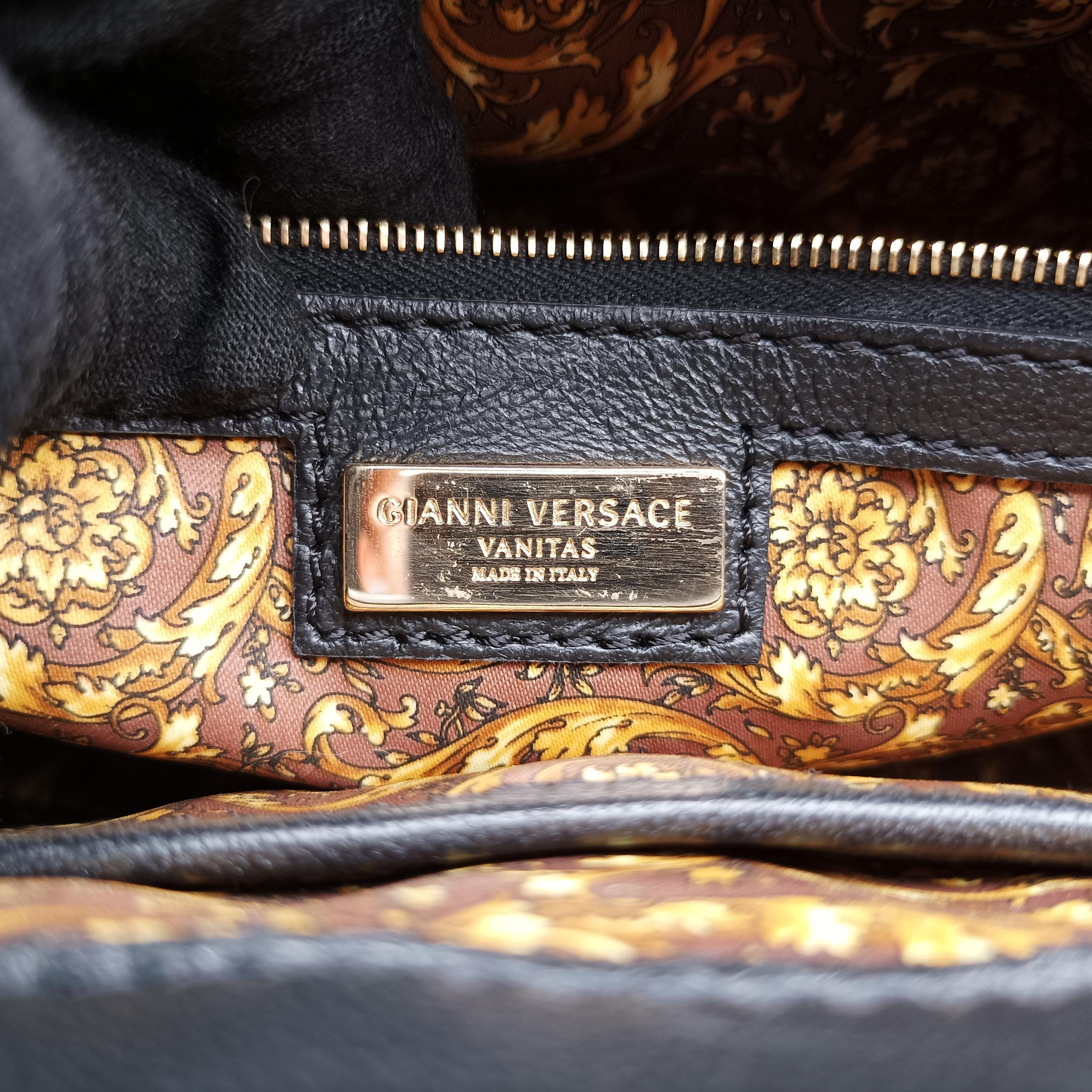 Vintage VERSACE Embossed Leather Talia Vanitas Black Leather  handbag | stylenewstar