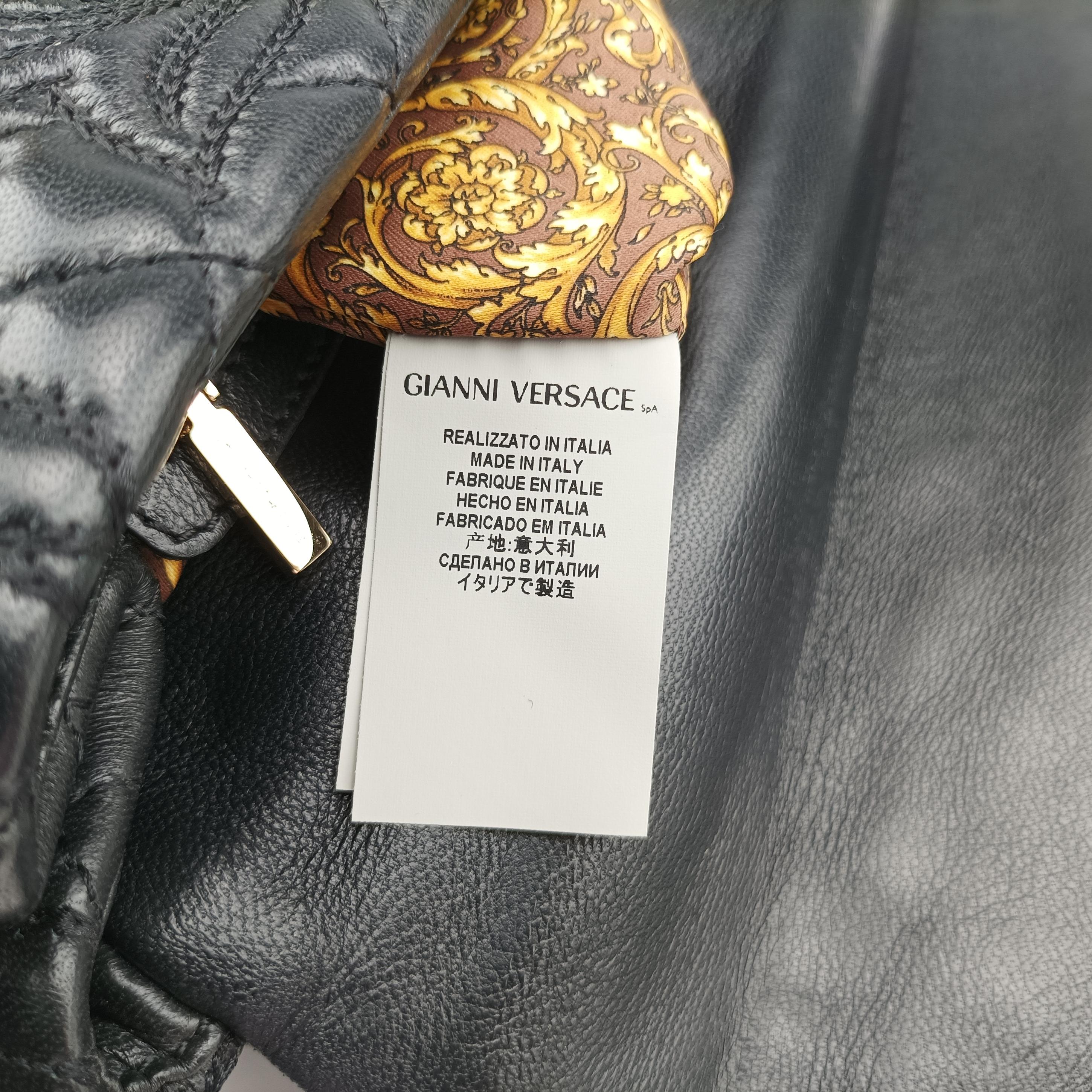 Vintage VERSACE Embossed Leather Talia Vanitas Black Leather  handbag | stylenewstar