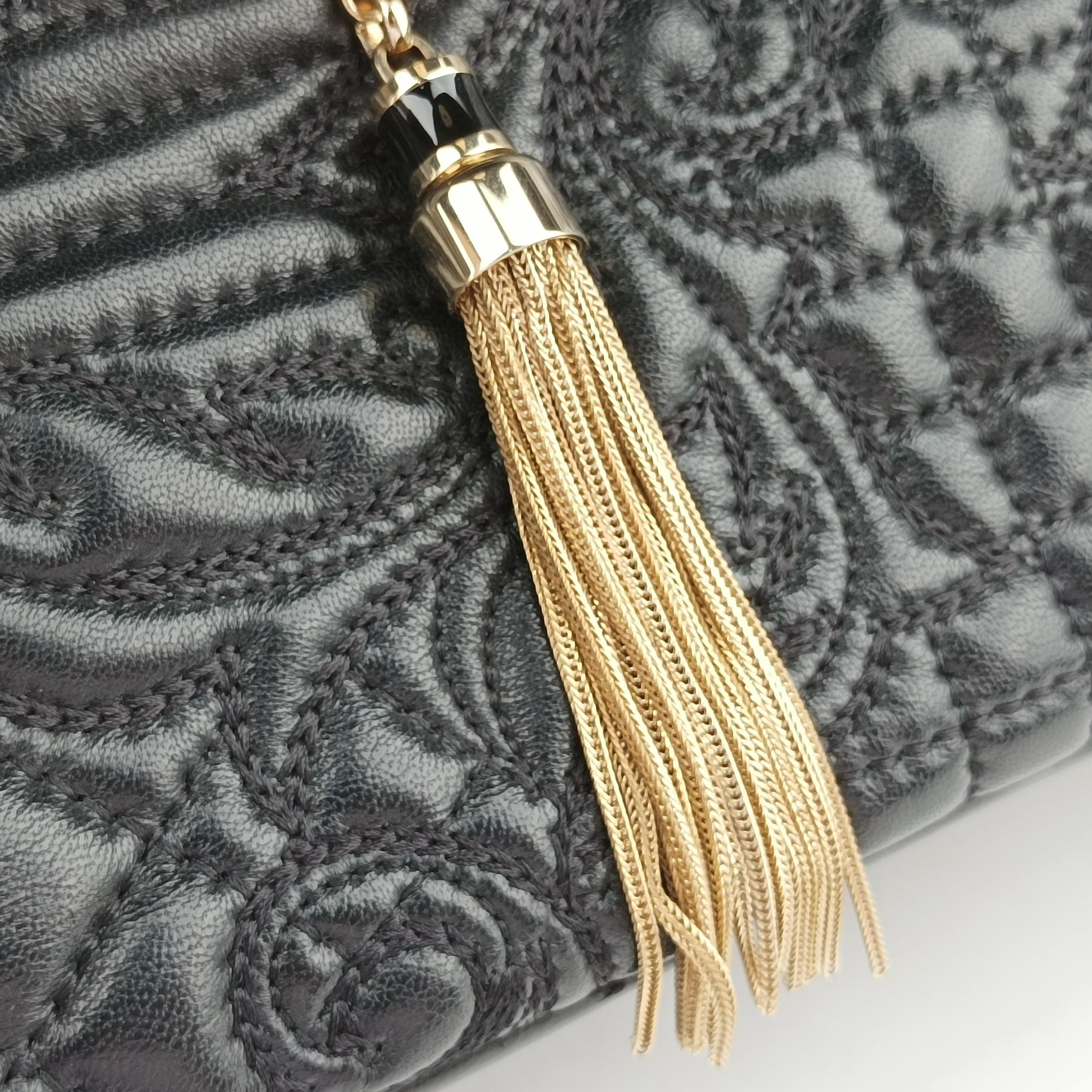 Vintage VERSACE Embossed Leather Talia Vanitas Black Leather  handbag | stylenewstar