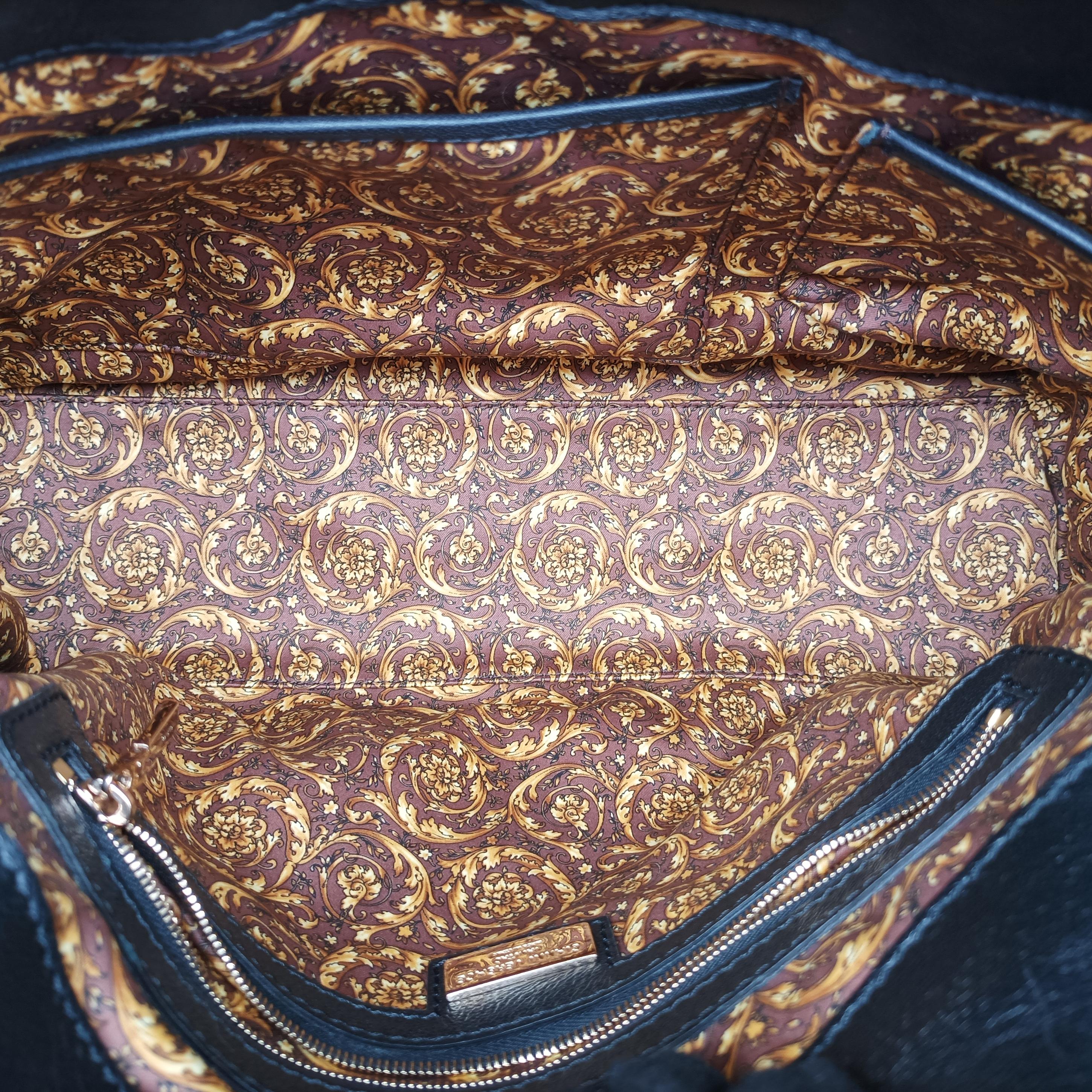 Vintage VERSACE Embossed Leather Talia Vanitas Black Leather  handbag | stylenewstar