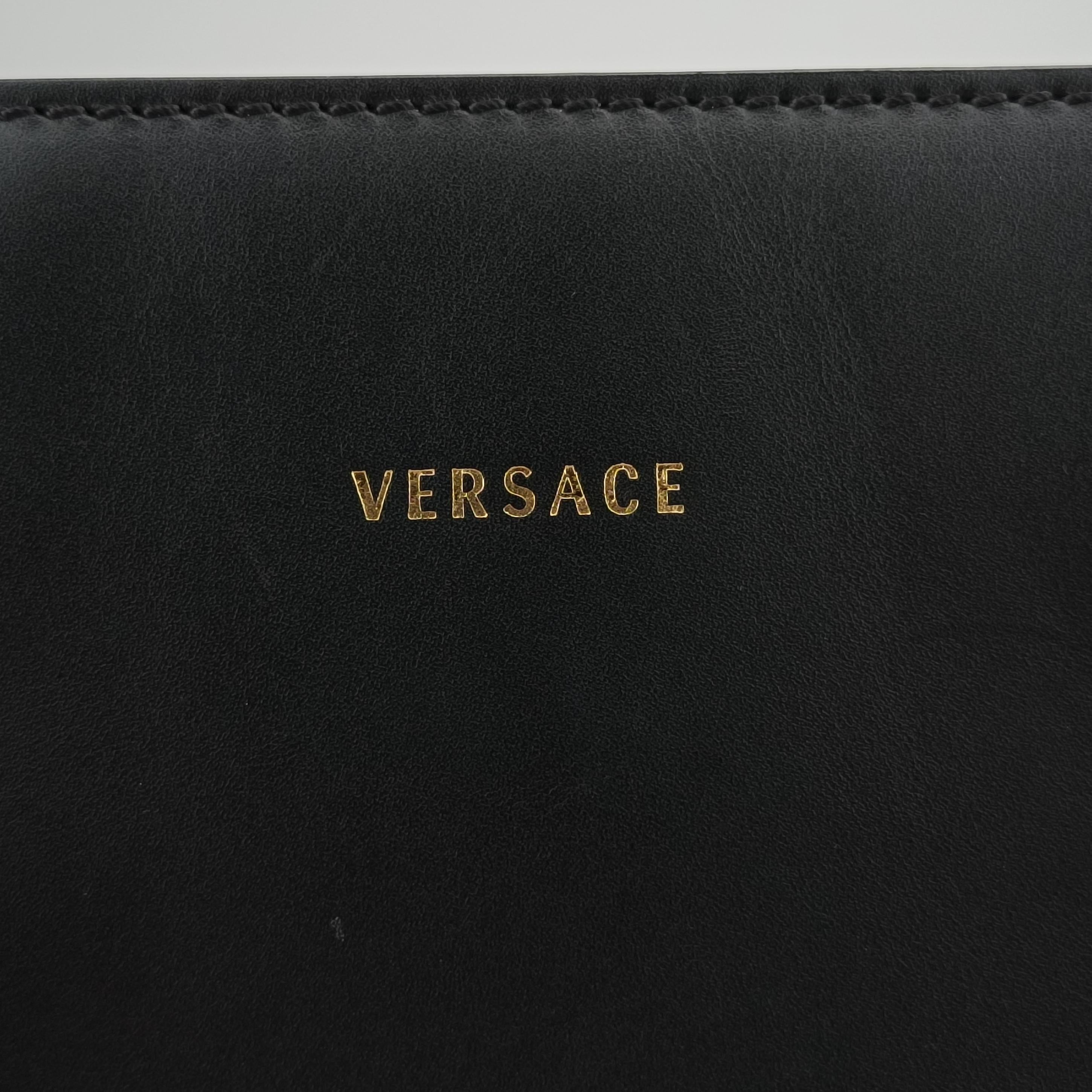 Pre-owned VERSACE medusa Black leather  handbag | stylenewstar