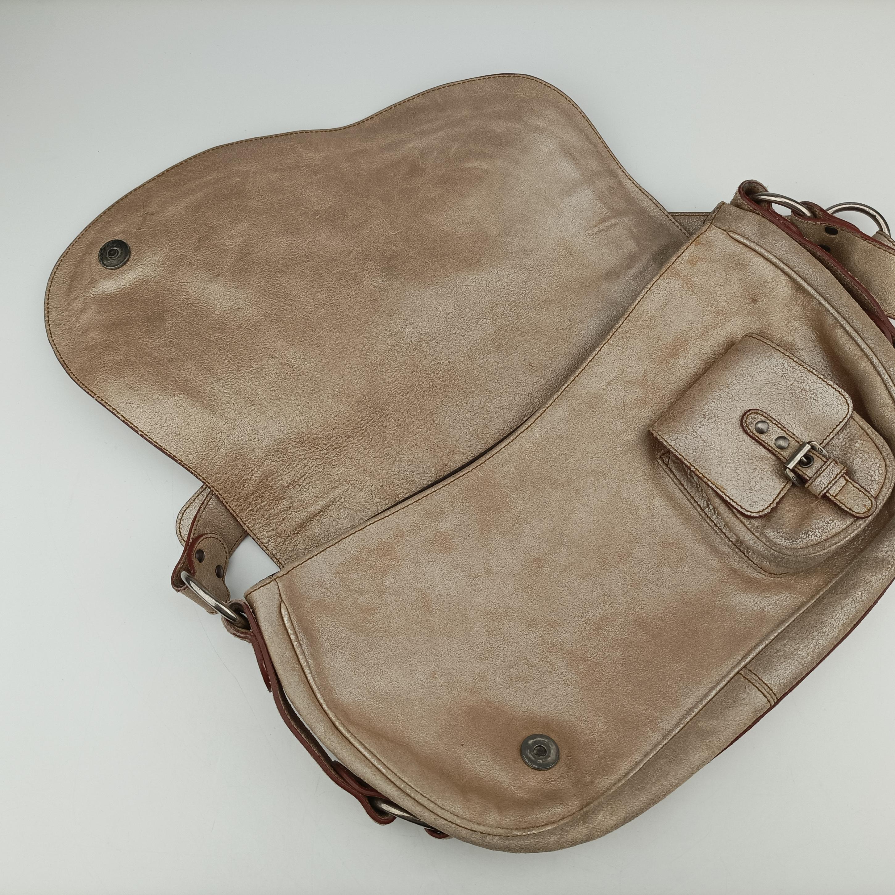 Pre-owned Christian Dior Gaucho Golden Leather  handbag | stylenewstar