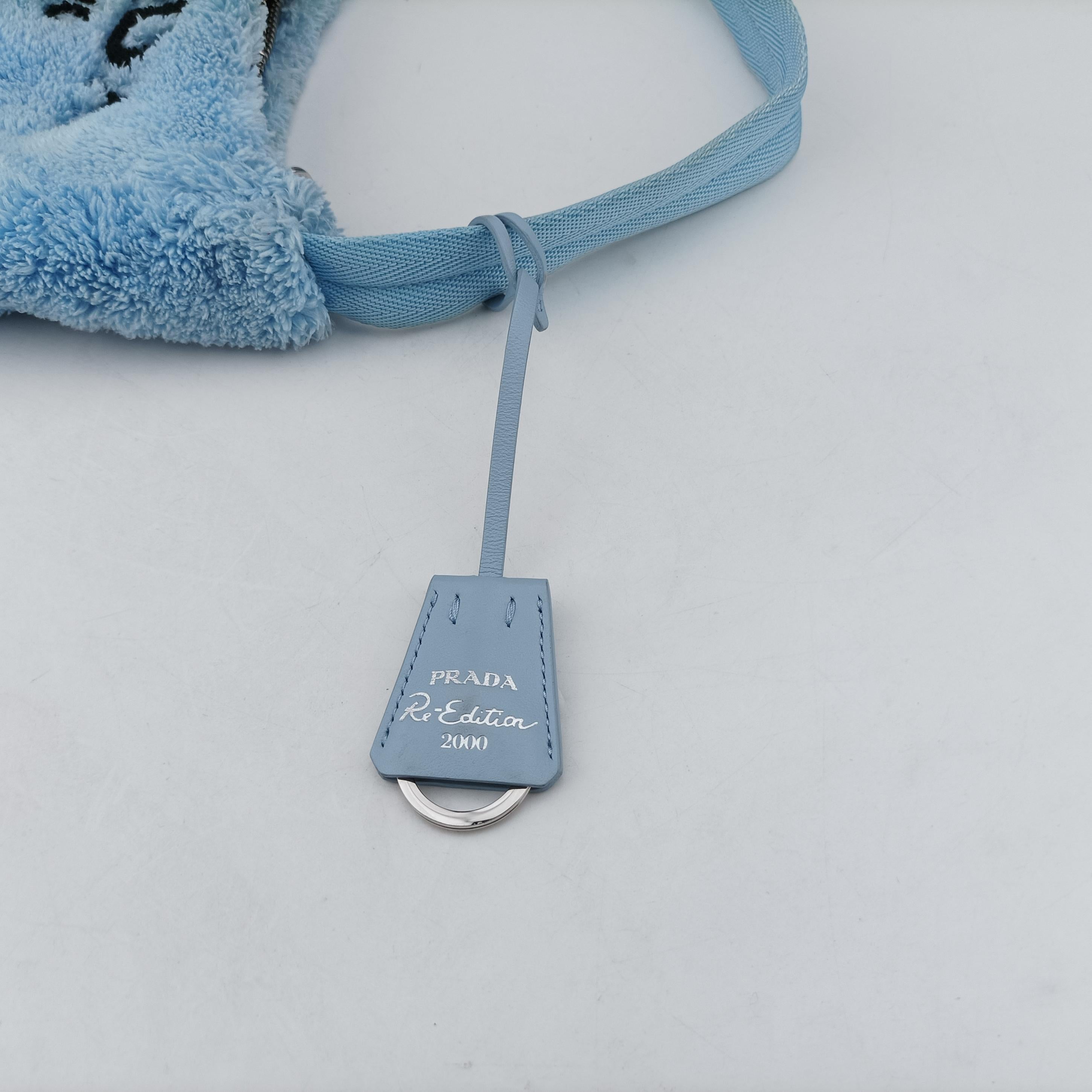 Pre-owned Prada Re-Edition2000 Blue Terry cloth 1NE515 handbag | stylenewstar