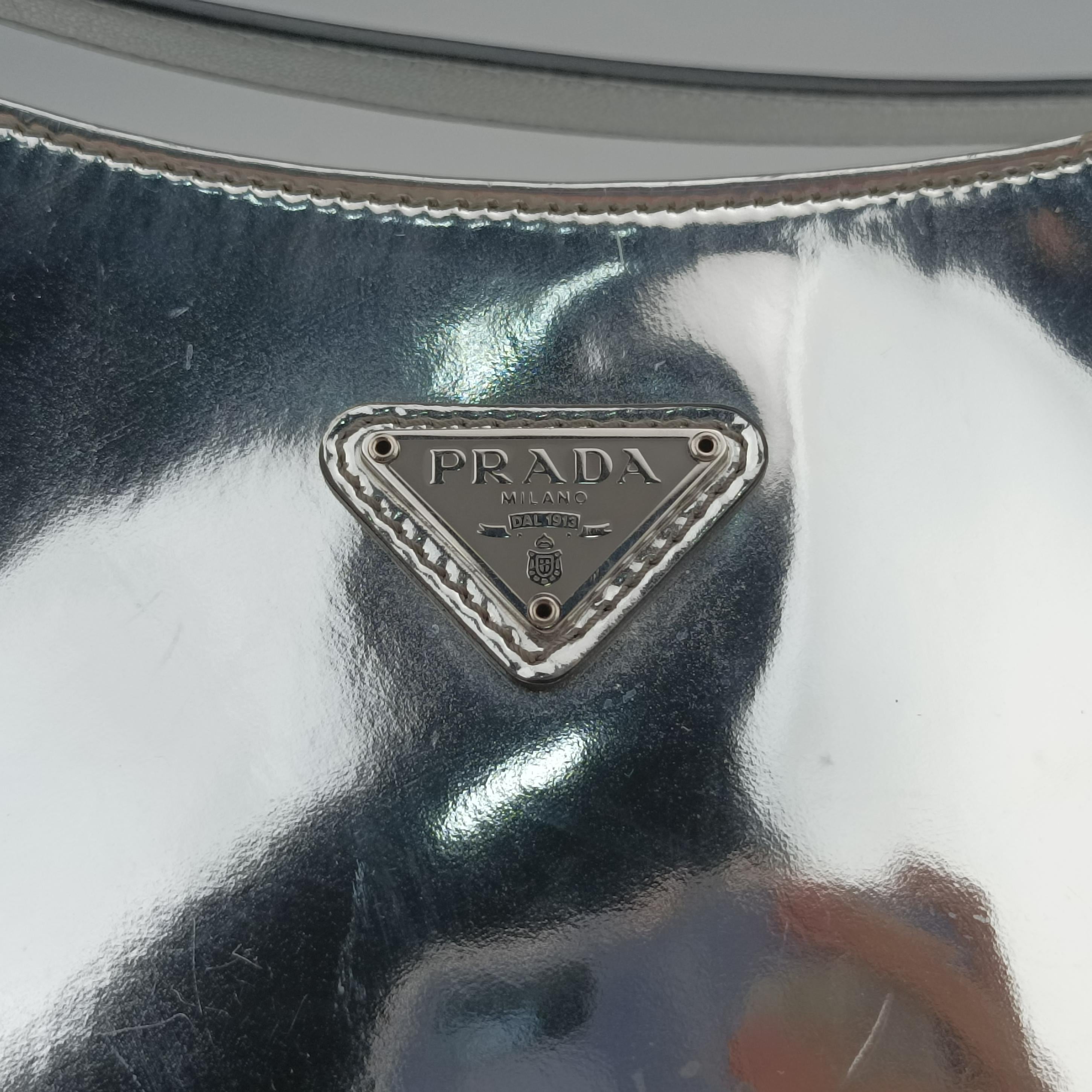 Pre-owned Prada Cleo Silver Enamel 1BC499 shoulderbag | stylenewstar