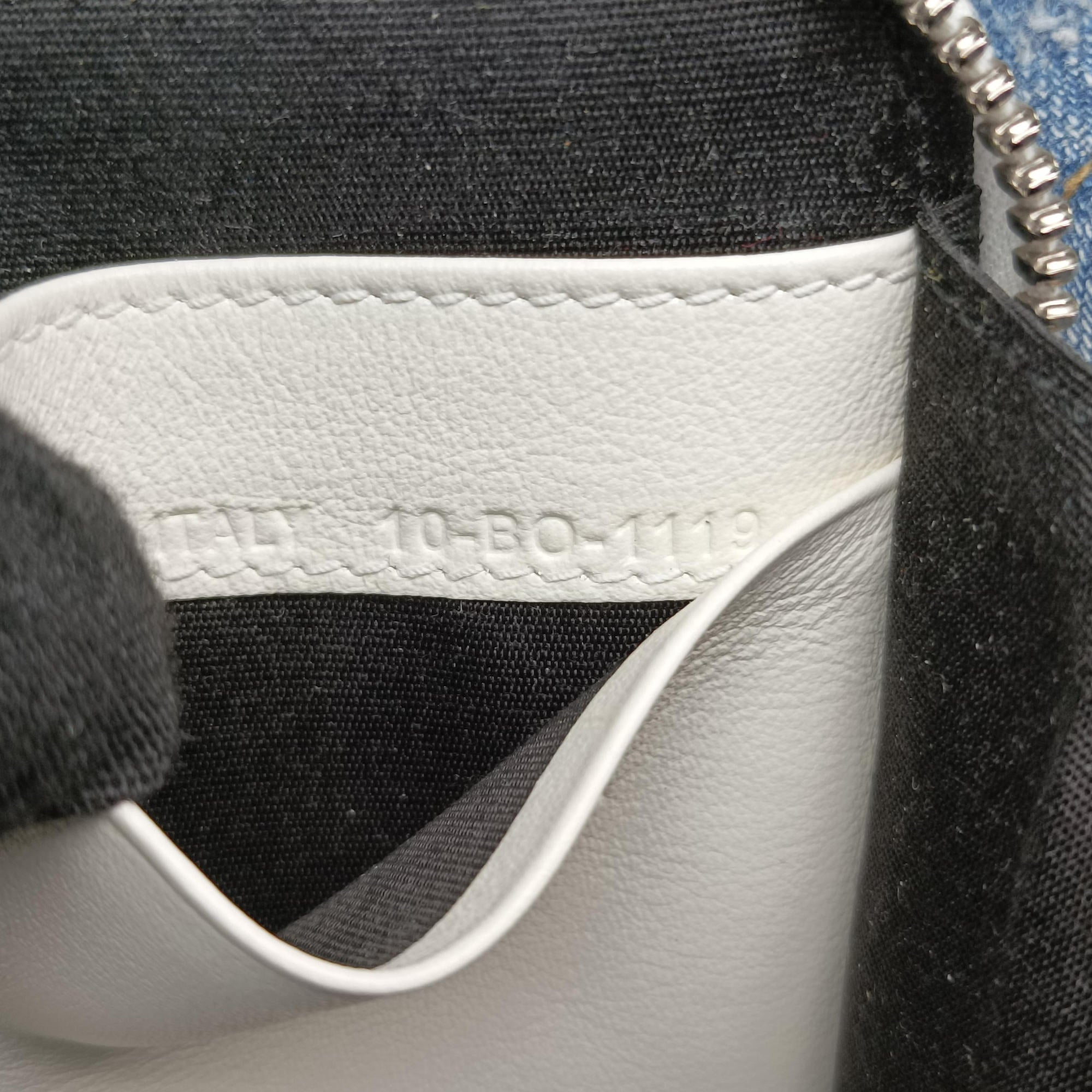 Secondhand Christian Dior Daniel Arsham collaboration Newspaper Print White Leather  shoulderbag | stylenewstar