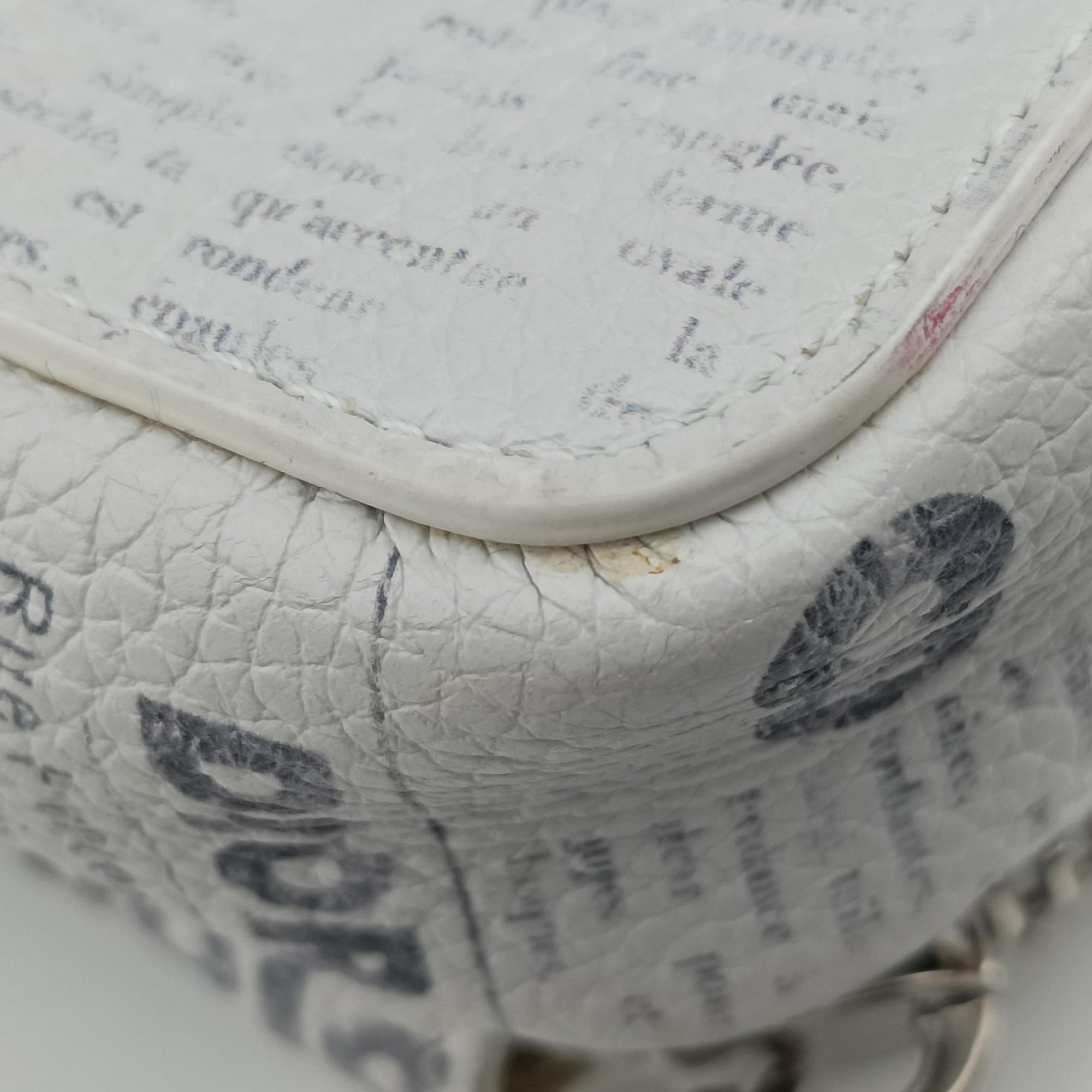 Secondhand Christian Dior Daniel Arsham collaboration Newspaper Print White Leather  shoulderbag | stylenewstar