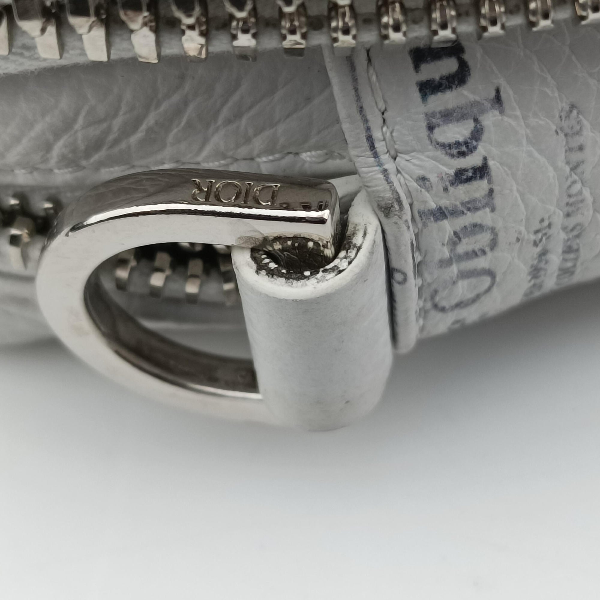 Secondhand Christian Dior Daniel Arsham collaboration Newspaper Print White Leather  shoulderbag | stylenewstar
