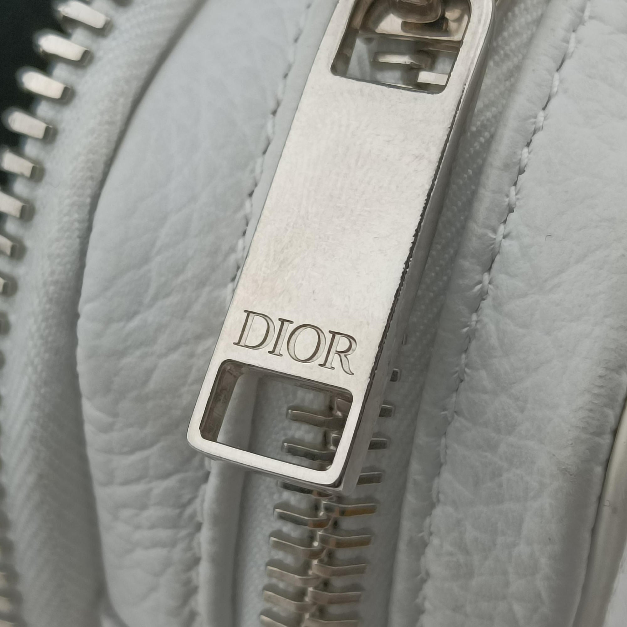 Secondhand Christian Dior Daniel Arsham collaboration Newspaper Print White Leather  shoulderbag | stylenewstar