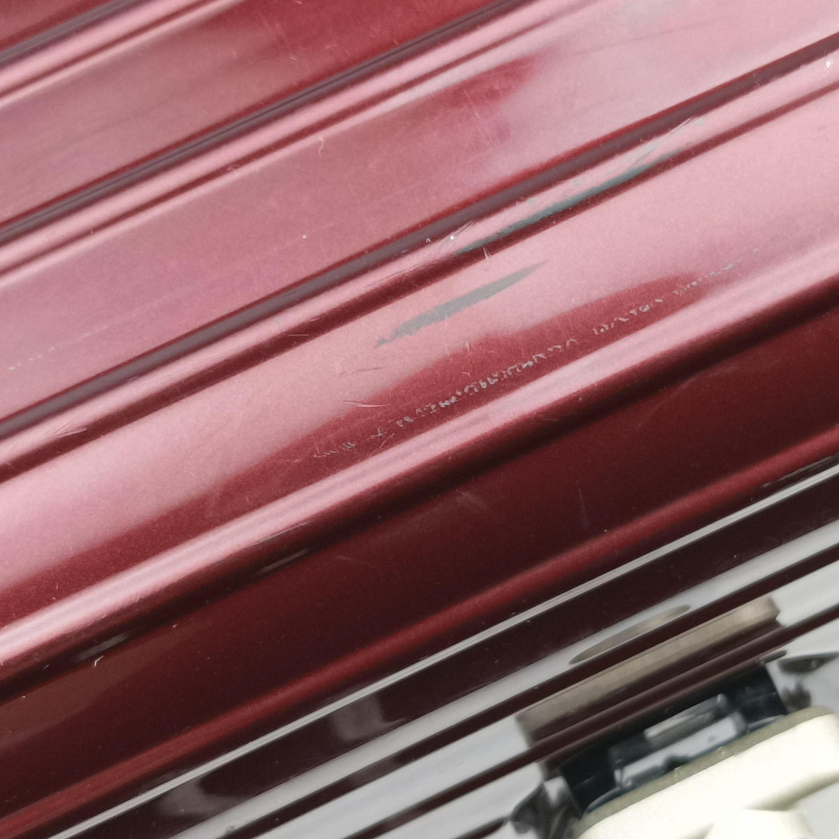 Secondhand RIMOWA TOPAS Red aluminum  suitcase | stylenewstar