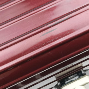 Secondhand RIMOWA TOPAS Red aluminum  suitcase | stylenewstar