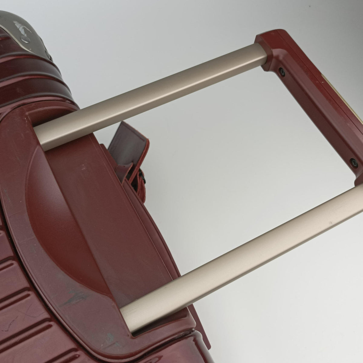 Secondhand RIMOWA TOPAS Red aluminum  suitcase | stylenewstar