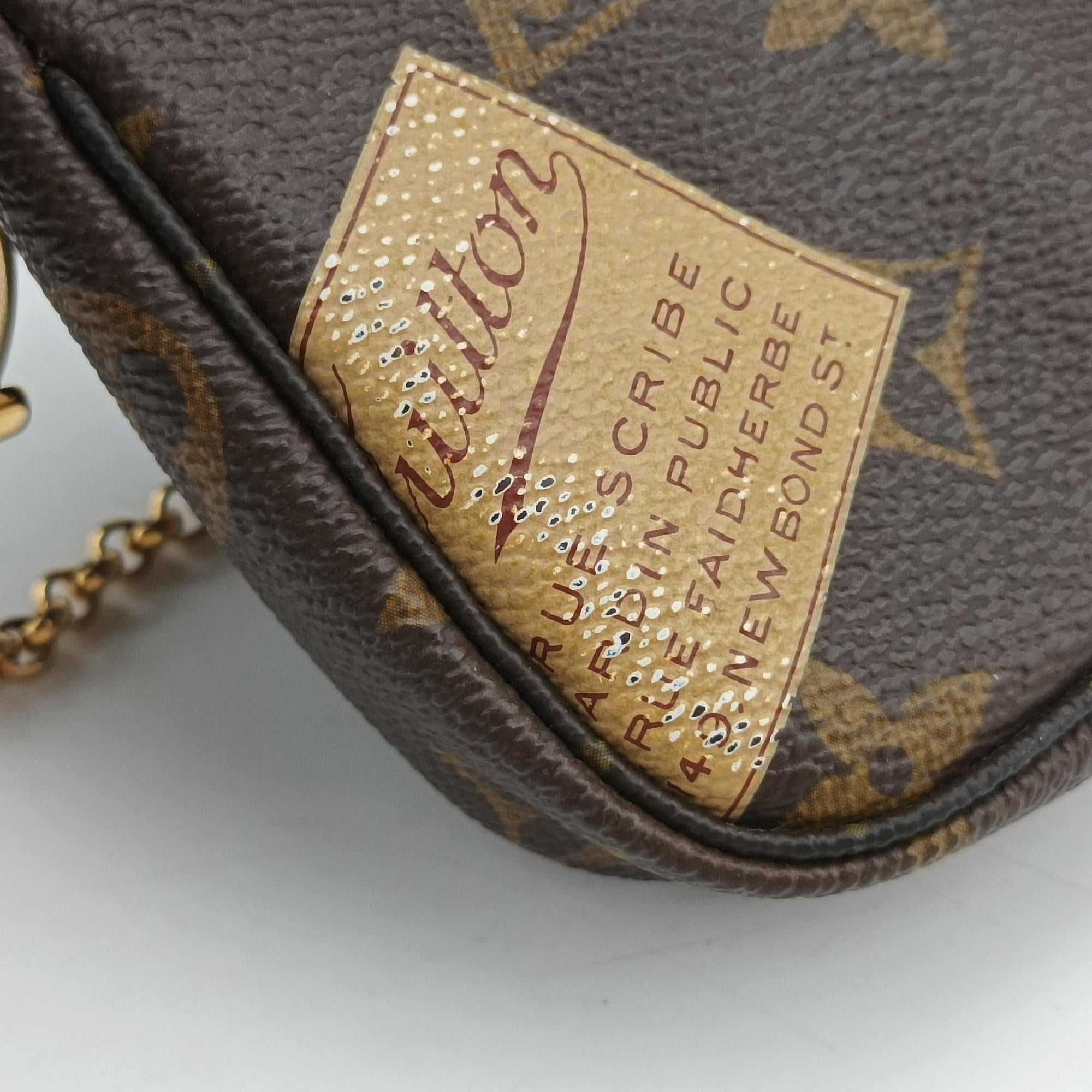 Pre-owned Louis Vuitton Mini Pochette Accessoires Brown Monogram Canvas M63798 handbag | stylenewstar