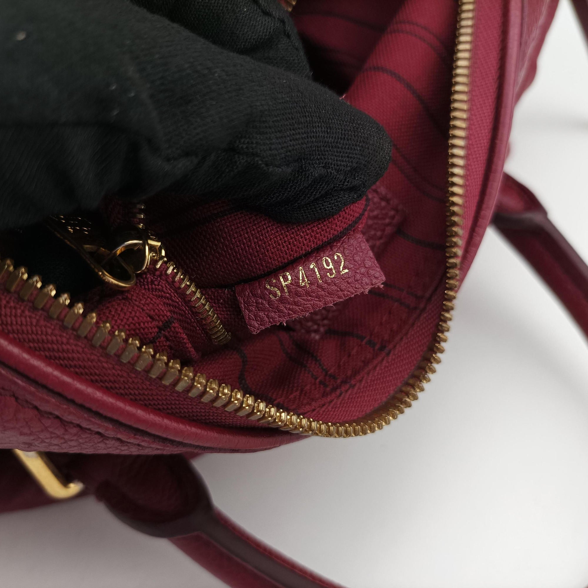 Pre-owned Louis Vuitton Speedy Bandouliere 25 Aurore Purple Monogram Empreinte M40764 handbag | stylenewstar