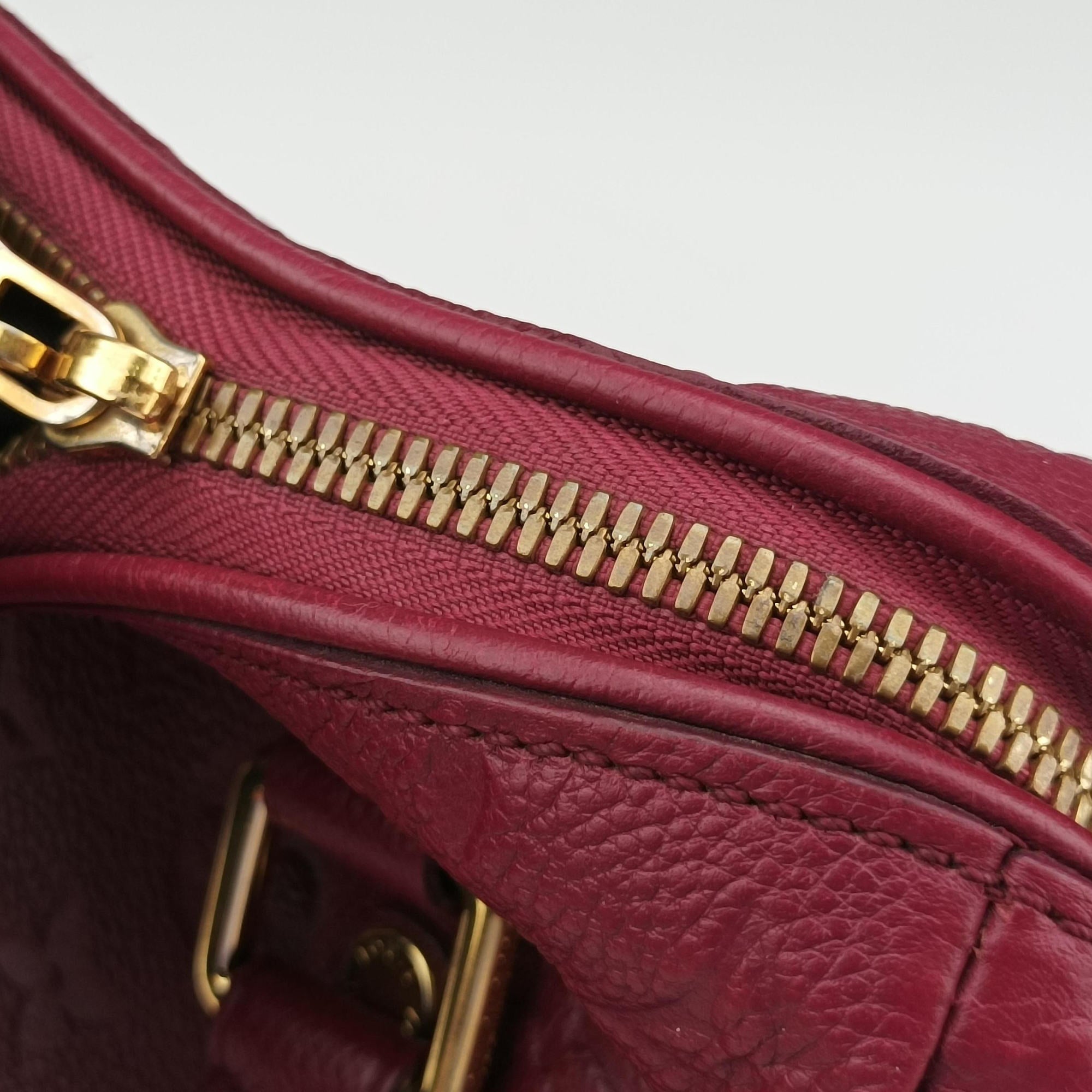 Pre-owned Louis Vuitton Speedy Bandouliere 25 Aurore Purple Monogram Empreinte M40764 handbag | stylenewstar