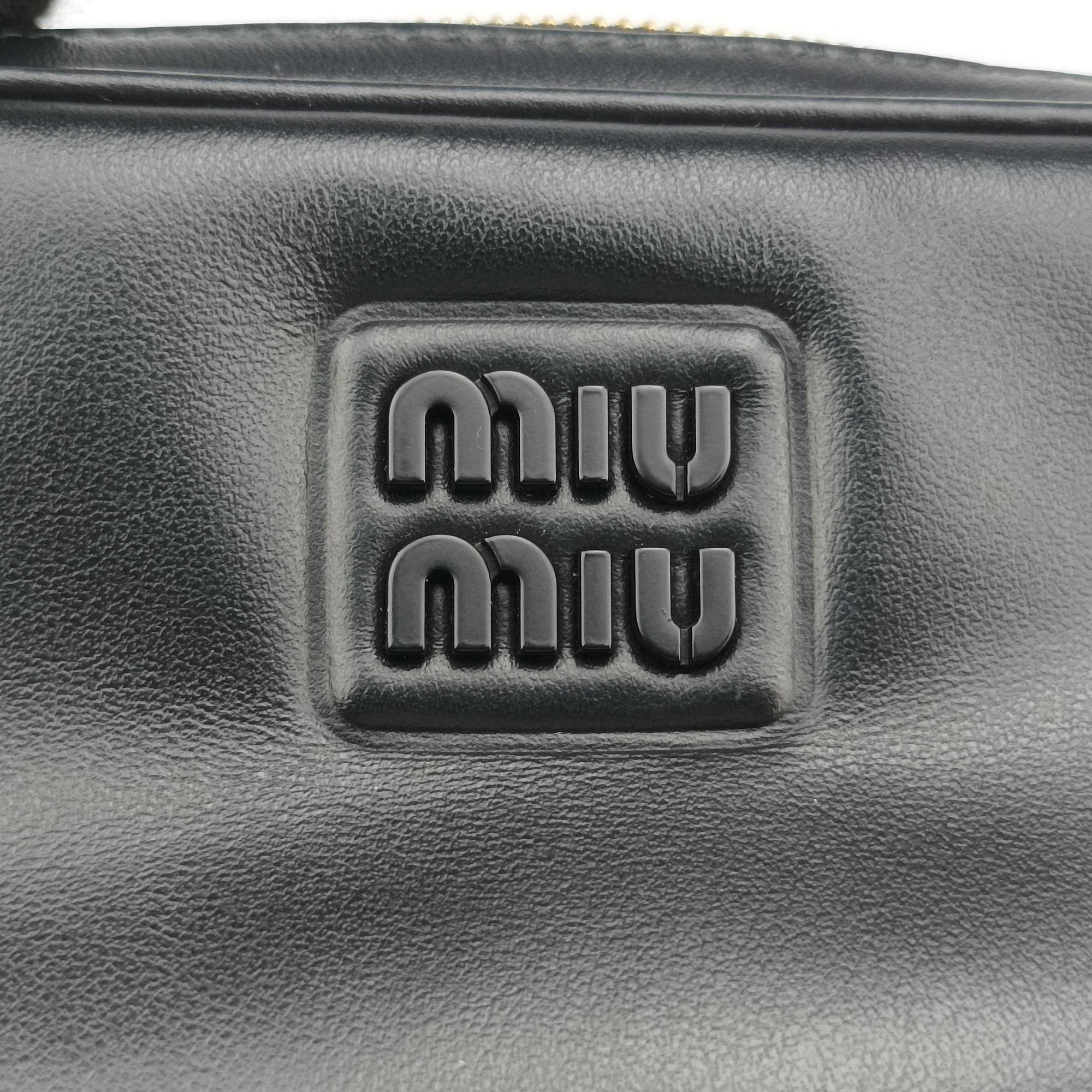Pre-owned Miu Miu logo Black leather  bum bag/waist bag | stylenewstar