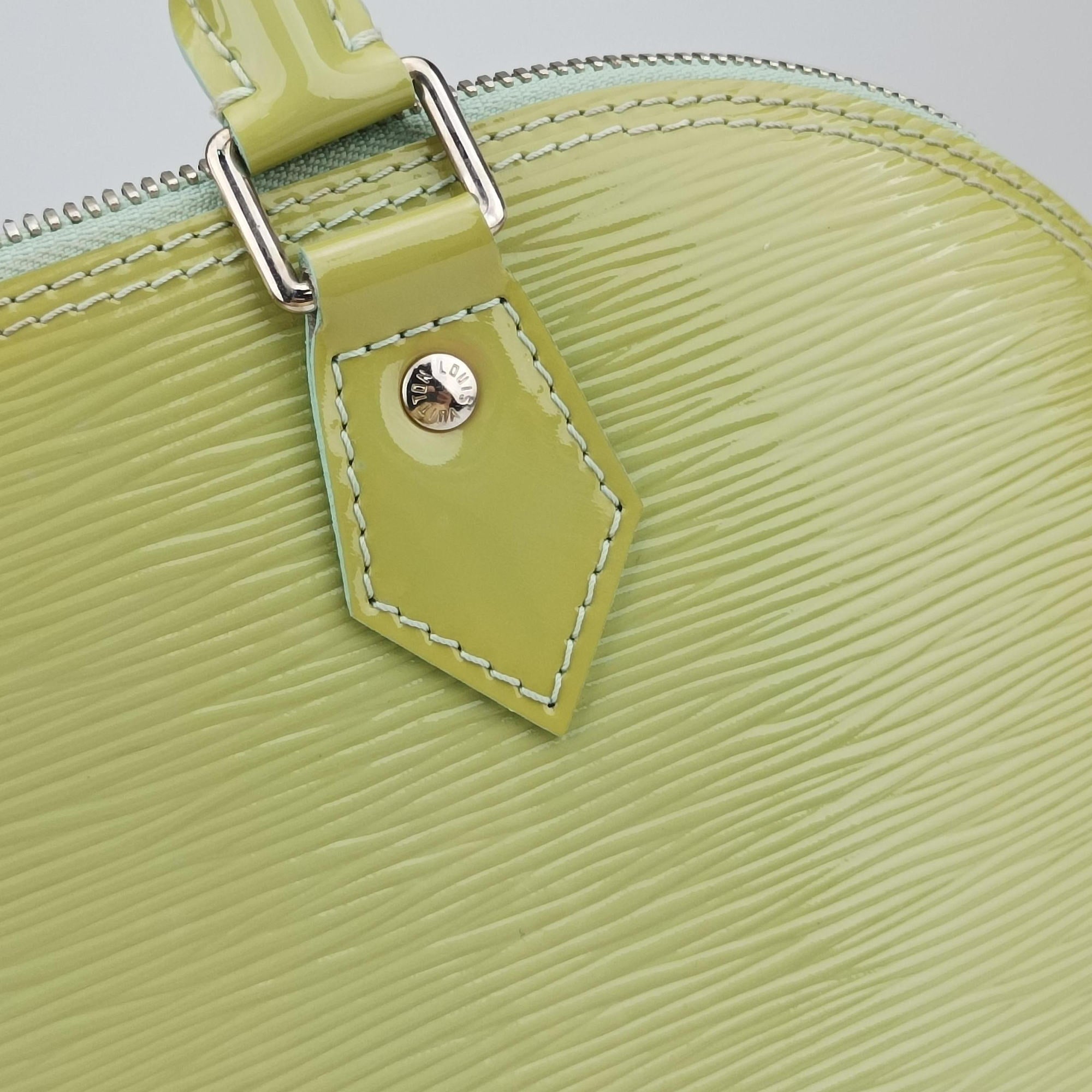 Pre-owned Louis Vuitton Alma PM Amando Electric epi M40625 handbag | stylenewstar