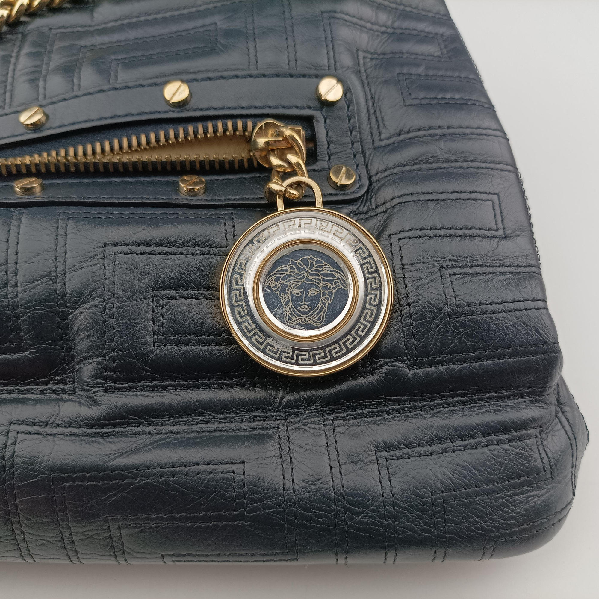 Vintage VERSACE Medusa quilted Navy Leather  handbag | stylenewstar