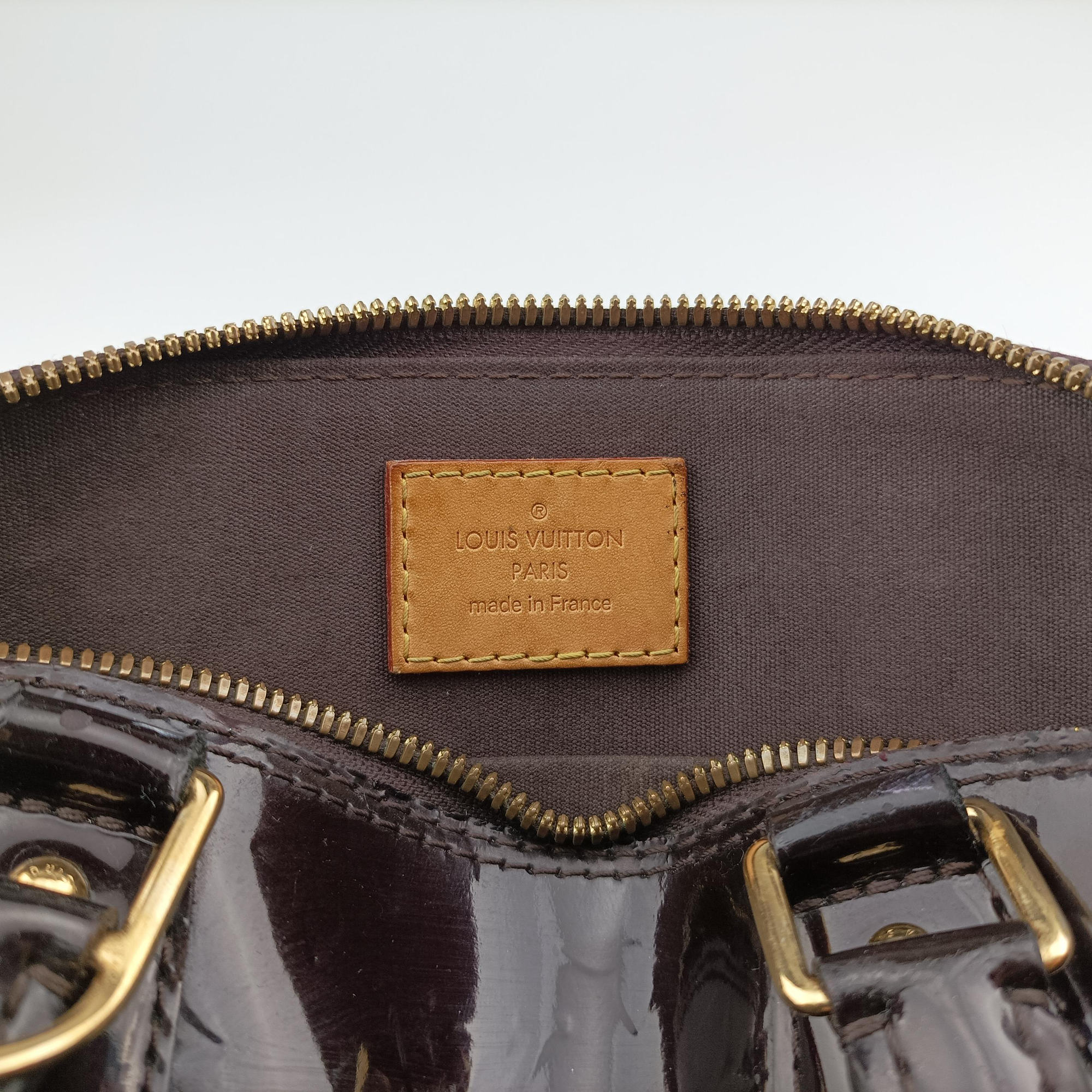 Secondhand Louis Vuitton Alma BB Amarante Vernis M91678 shoulderbag | stylenewstar