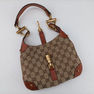 Pre-owned Gucci Piston Lock Jackie Hobo Brown canvas×leather 120885 handbag | stylenewstar