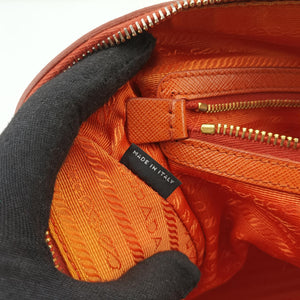 Secondhand Prada bowling Orange SAFFIANO Leather  shoulderbag | stylenewstar