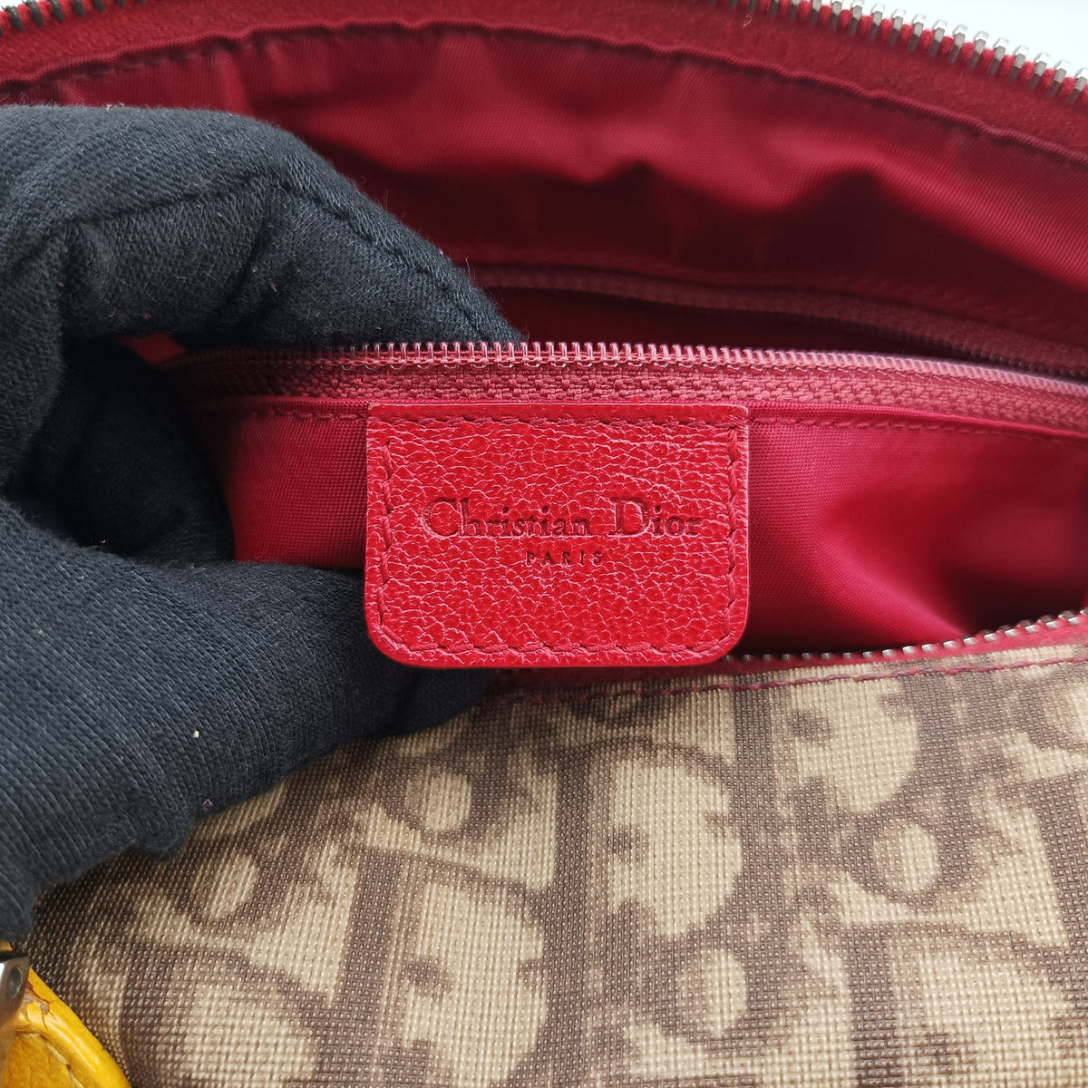 Secondhand Christian Dior Rasta Brown x Multicolor PVC-coated canvas x leather  handbag | stylenewstar