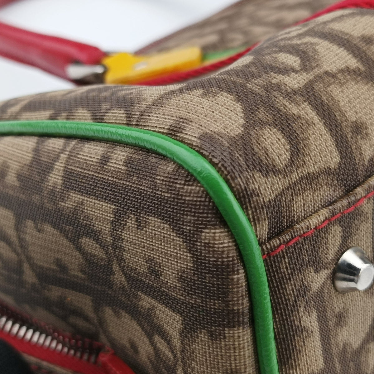 Secondhand Christian Dior Rasta Brown x Multicolor PVC-coated canvas x leather  handbag | stylenewstar