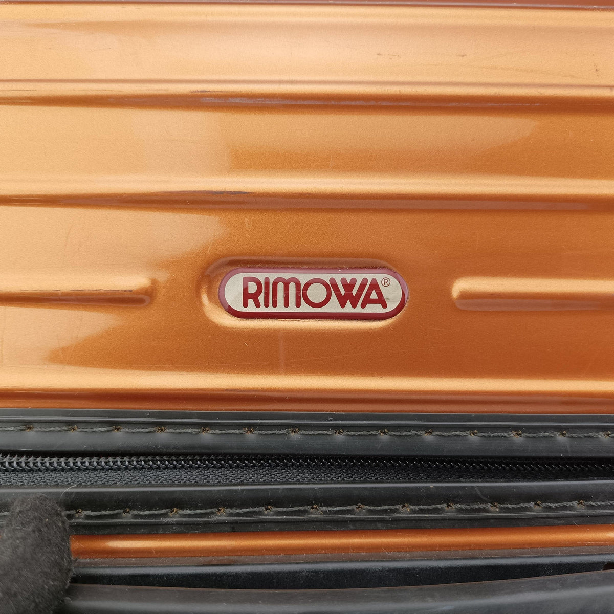Pre-owned RIMOWA TOPAS Orange aluminum  suitcase | stylenewstar