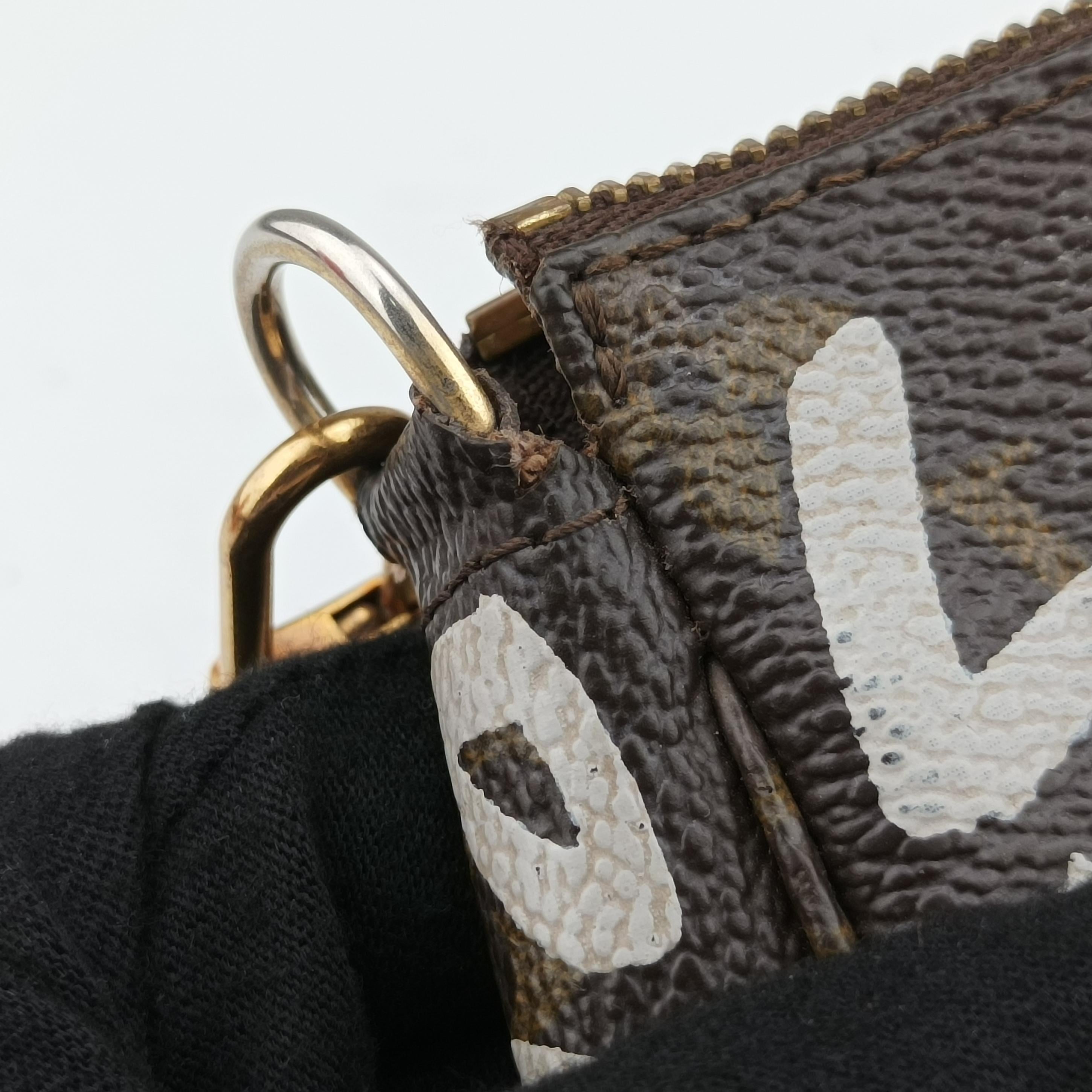 Secondhand Louis Vuitton Monogram Graffiti Pochette Accessoires Brown×Argent Monogram Graffiti M92192 handbag | stylenewstar