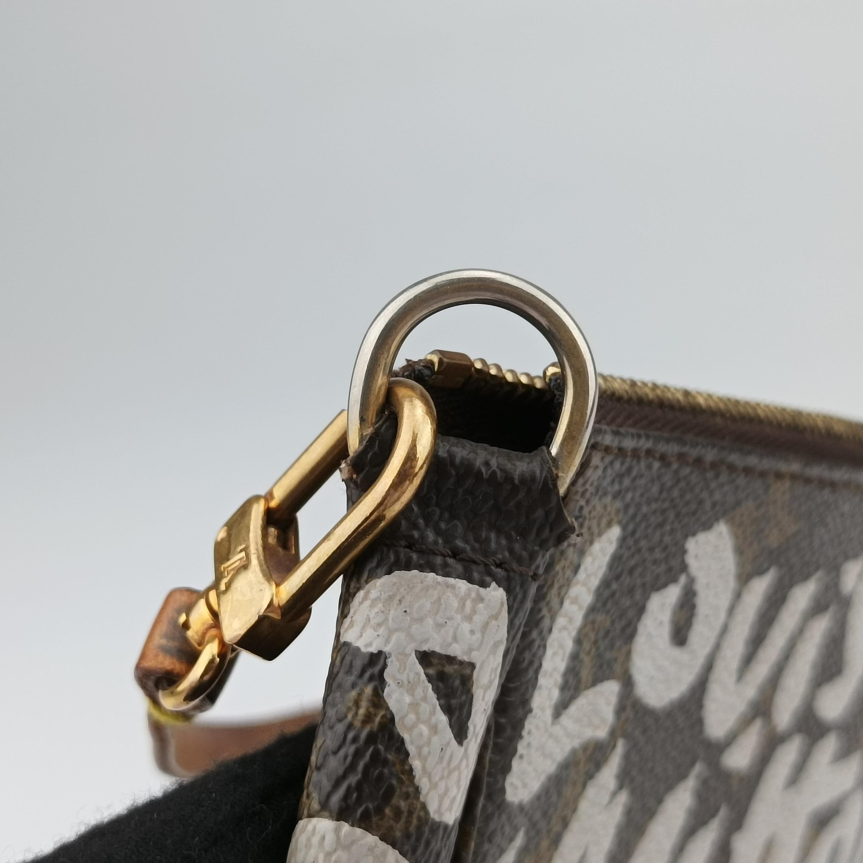 Secondhand Louis Vuitton Monogram Graffiti Pochette Accessoires Brown×Argent Monogram Graffiti M92192 handbag | stylenewstar