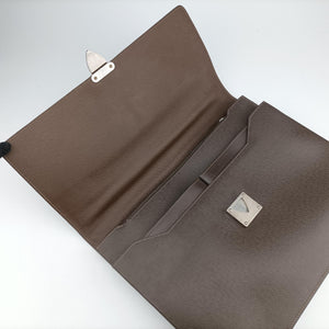 Pre-owned Louis Vuitton Serviette Moskova Grizzly Taiga M31058 handbag | stylenewstar