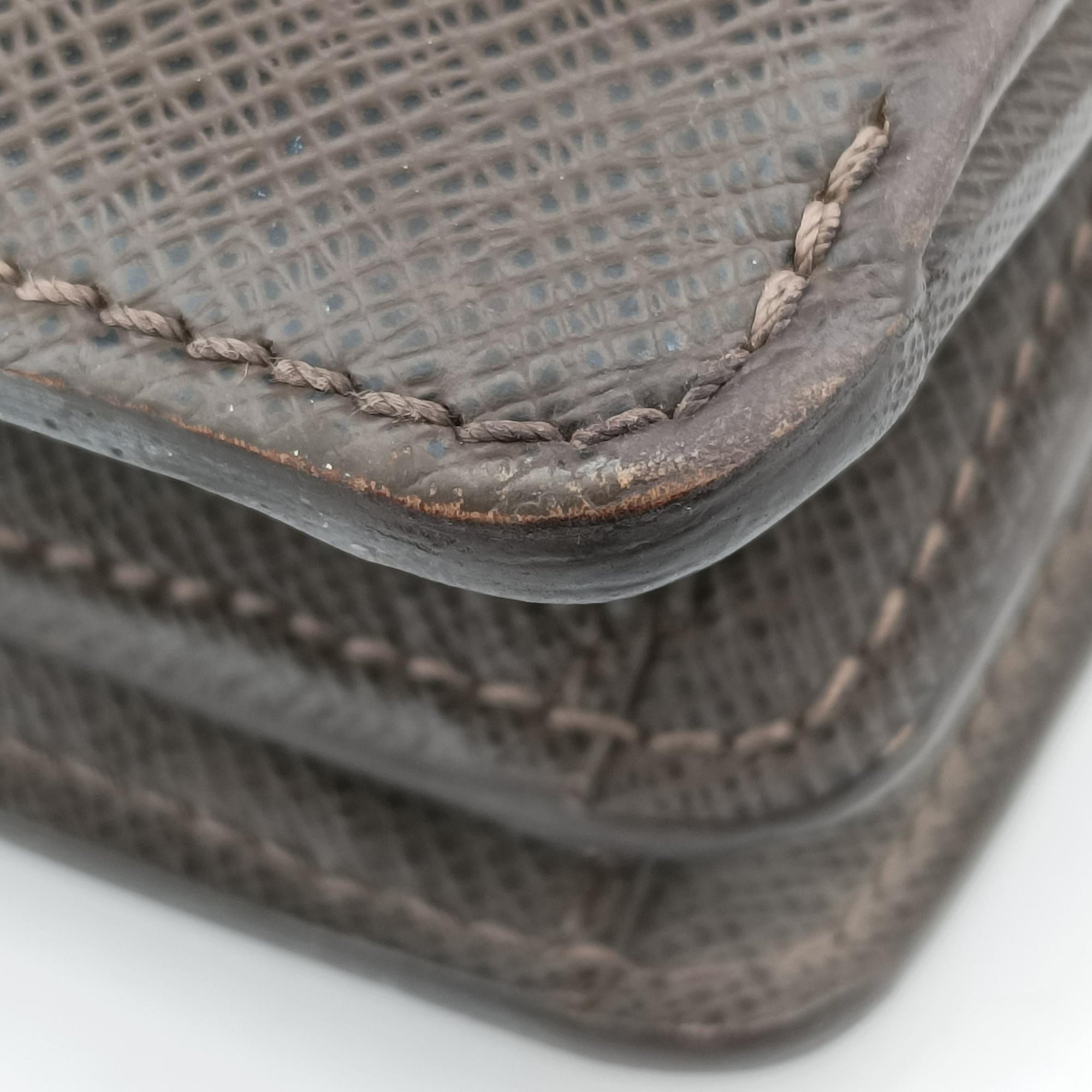 Pre-owned Louis Vuitton Serviette Moskova Grizzly Taiga M31058 handbag | stylenewstar