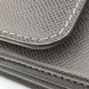 Pre-owned Louis Vuitton Serviette Moskova Grizzly Taiga M31058 handbag | stylenewstar