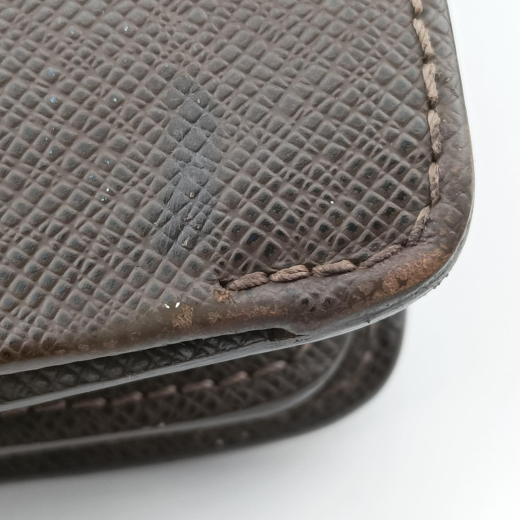 Pre-owned Louis Vuitton Serviette Moskova Grizzly Taiga M31058 handbag | stylenewstar