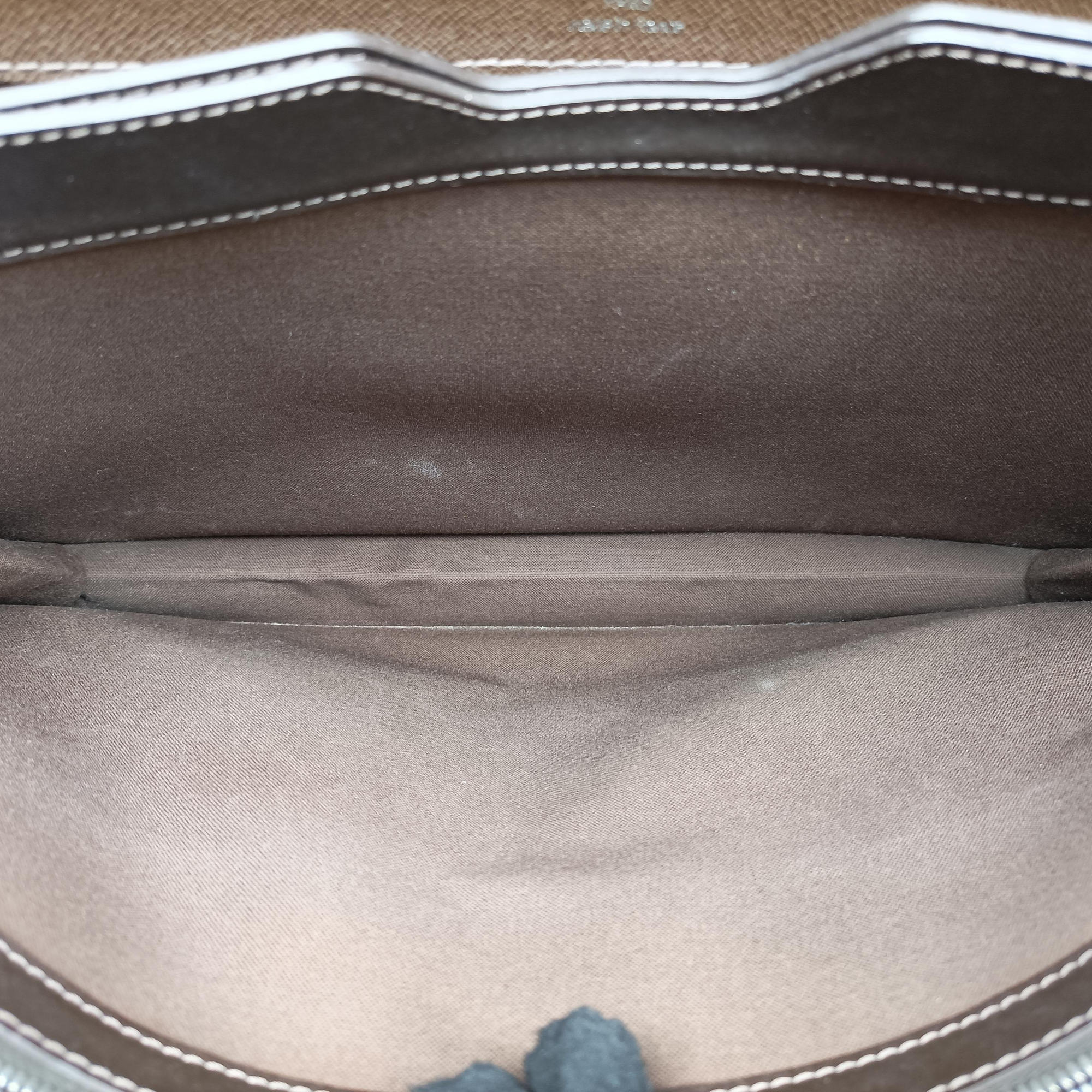 Pre-owned Louis Vuitton Serviette Moskova Grizzly Taiga M31058 handbag | stylenewstar