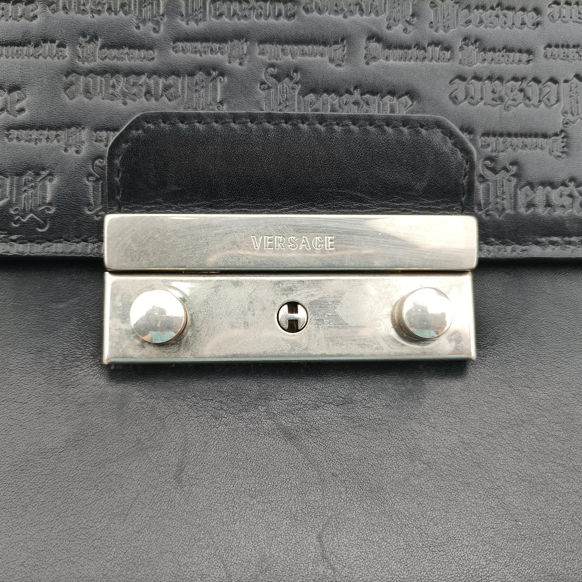 Pre-owned VERSACE Embossed Logo Top Handle Messenger Black Leather  shoulderbag | stylenewstar