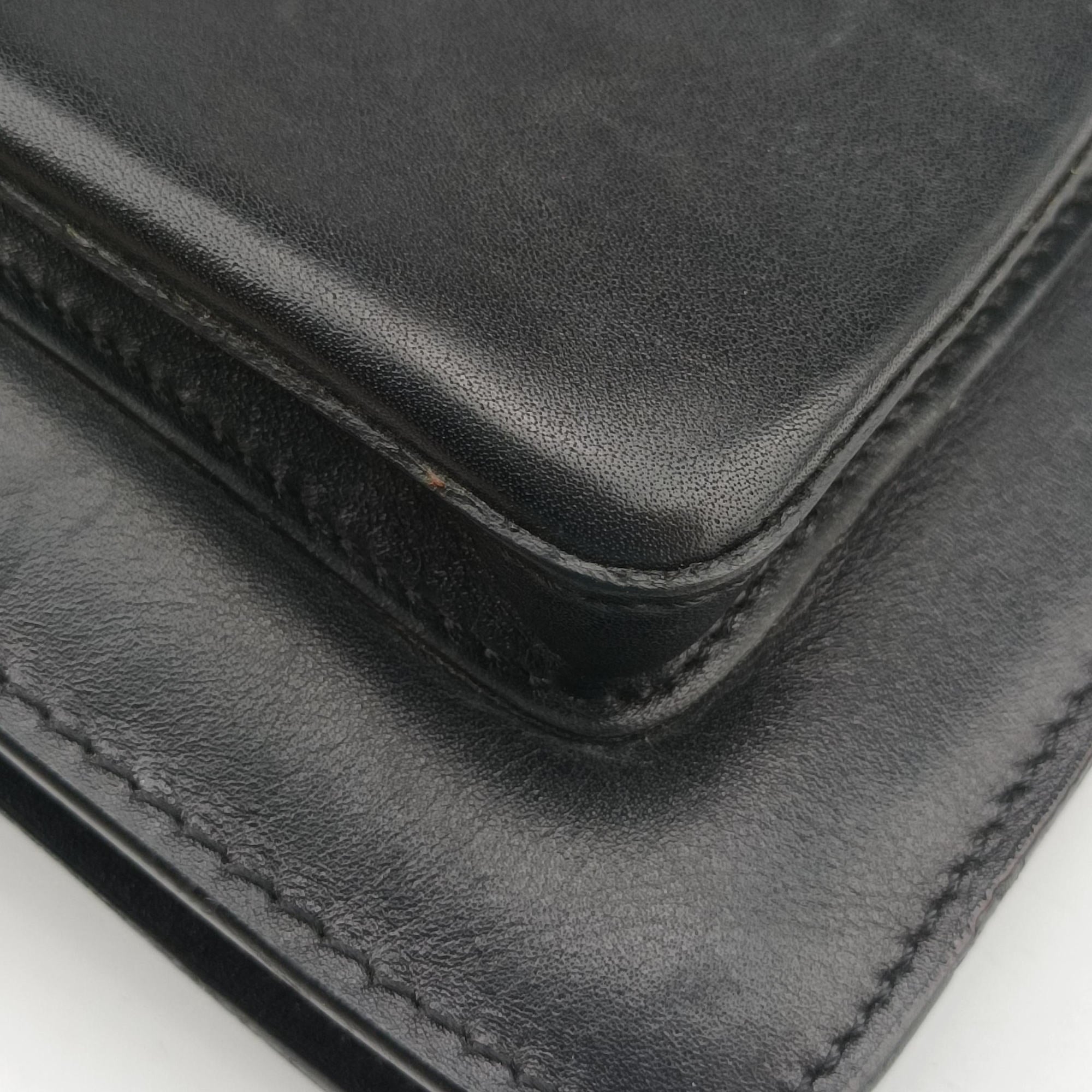 Pre-owned VERSACE Embossed Logo Top Handle Messenger Black Leather  shoulderbag | stylenewstar