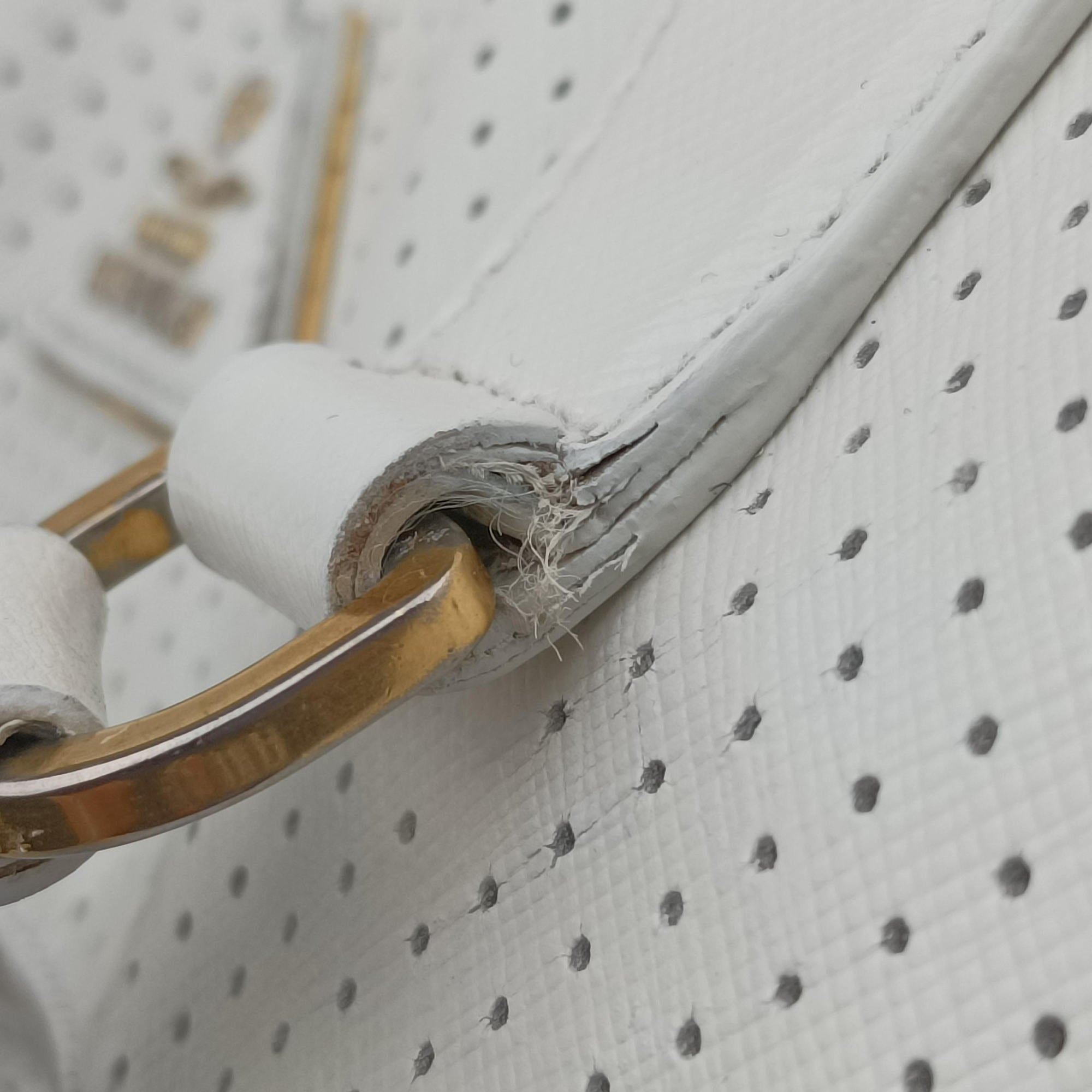 Secondhand Prada Perforated White leather  handbag | stylenewstar