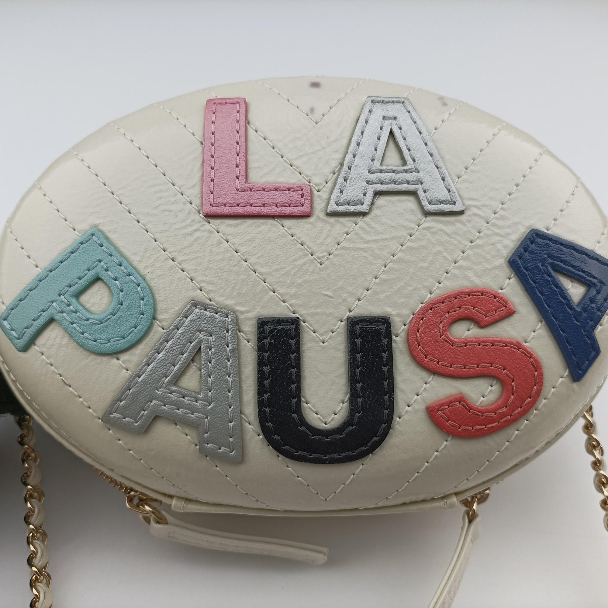 Vintage Chanel LA PAUSA Shiny Chevron Oval Tassel White Leather AS0204 shoulderbag | stylenewstar