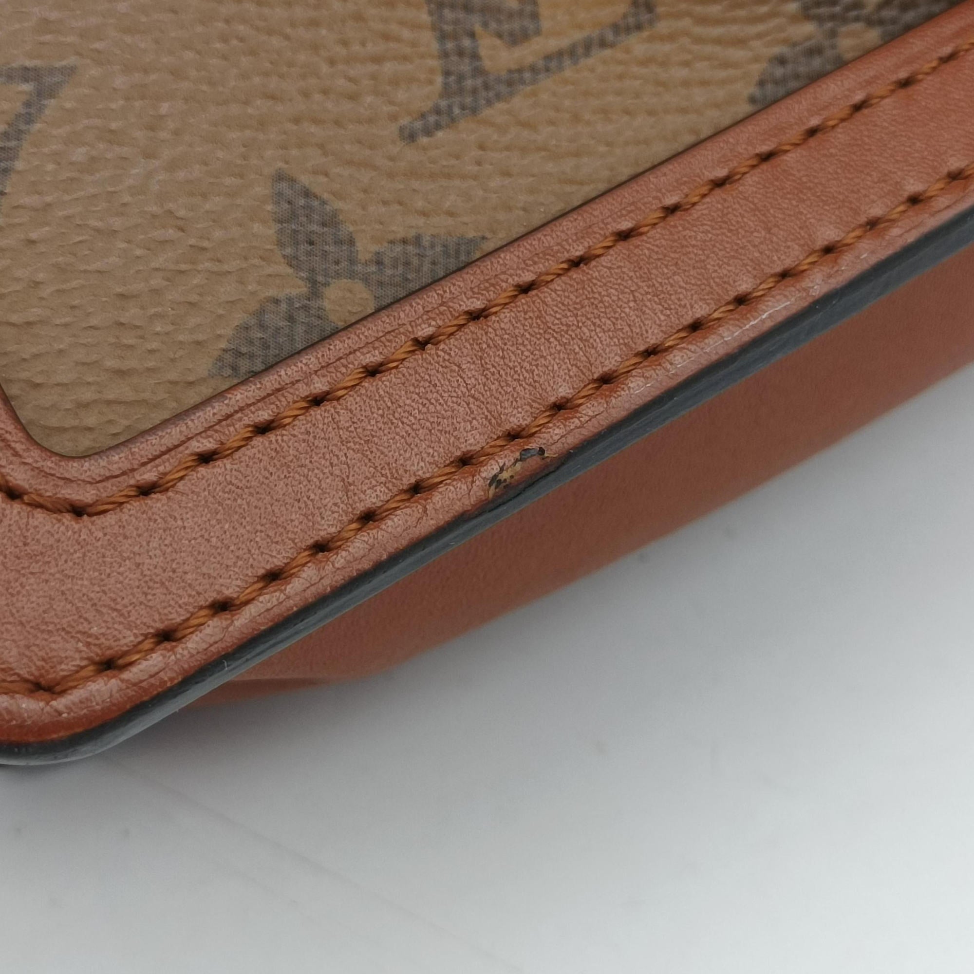 Pre-owned Louis Vuitton DAUPHINE brown monogram reverse M44586 bum bag/waist bag | stylenewstar