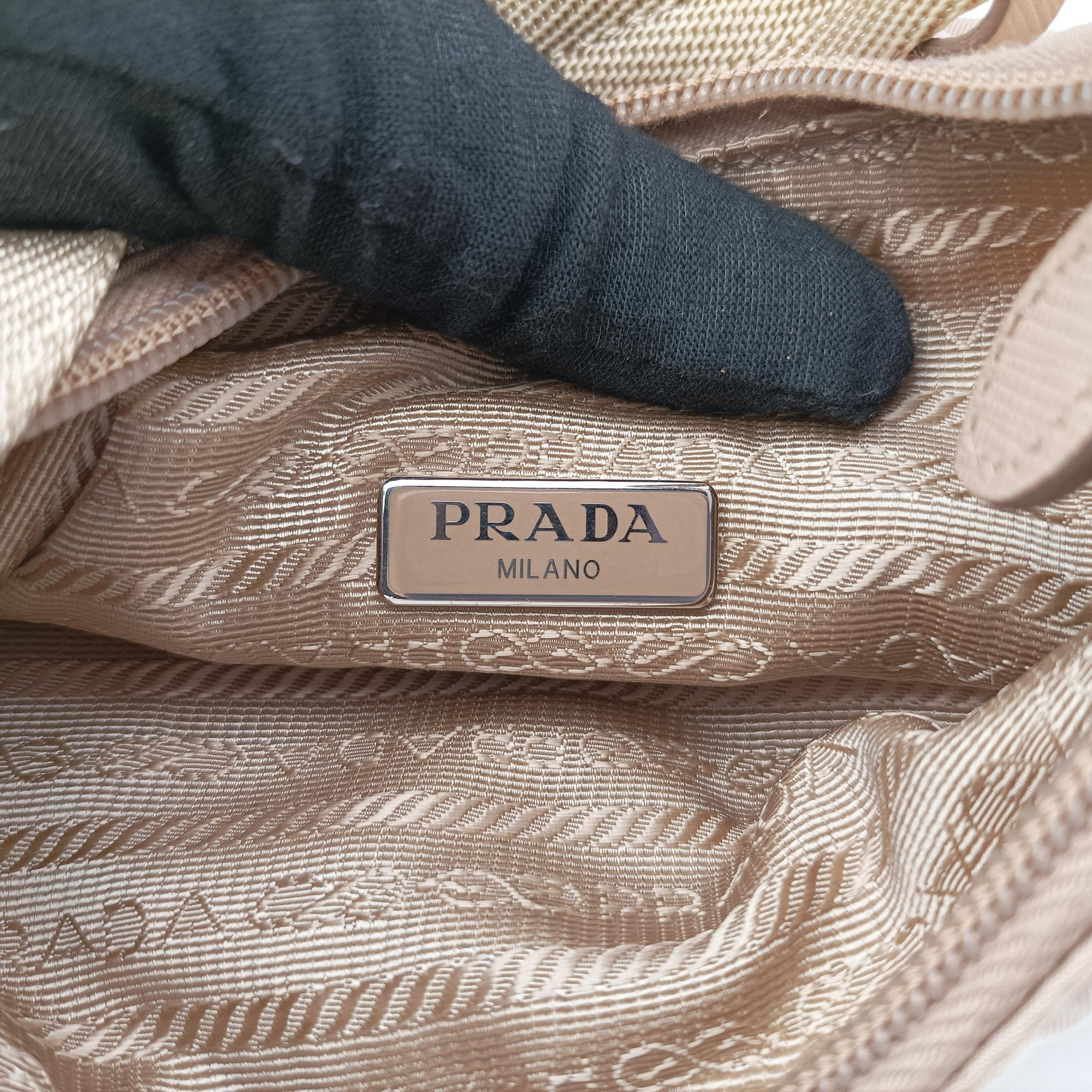 Pre-owned Prada Re-Edition 2005 Re-Nylon Bag Beige nylon 1BH204 handbag | stylenewstar