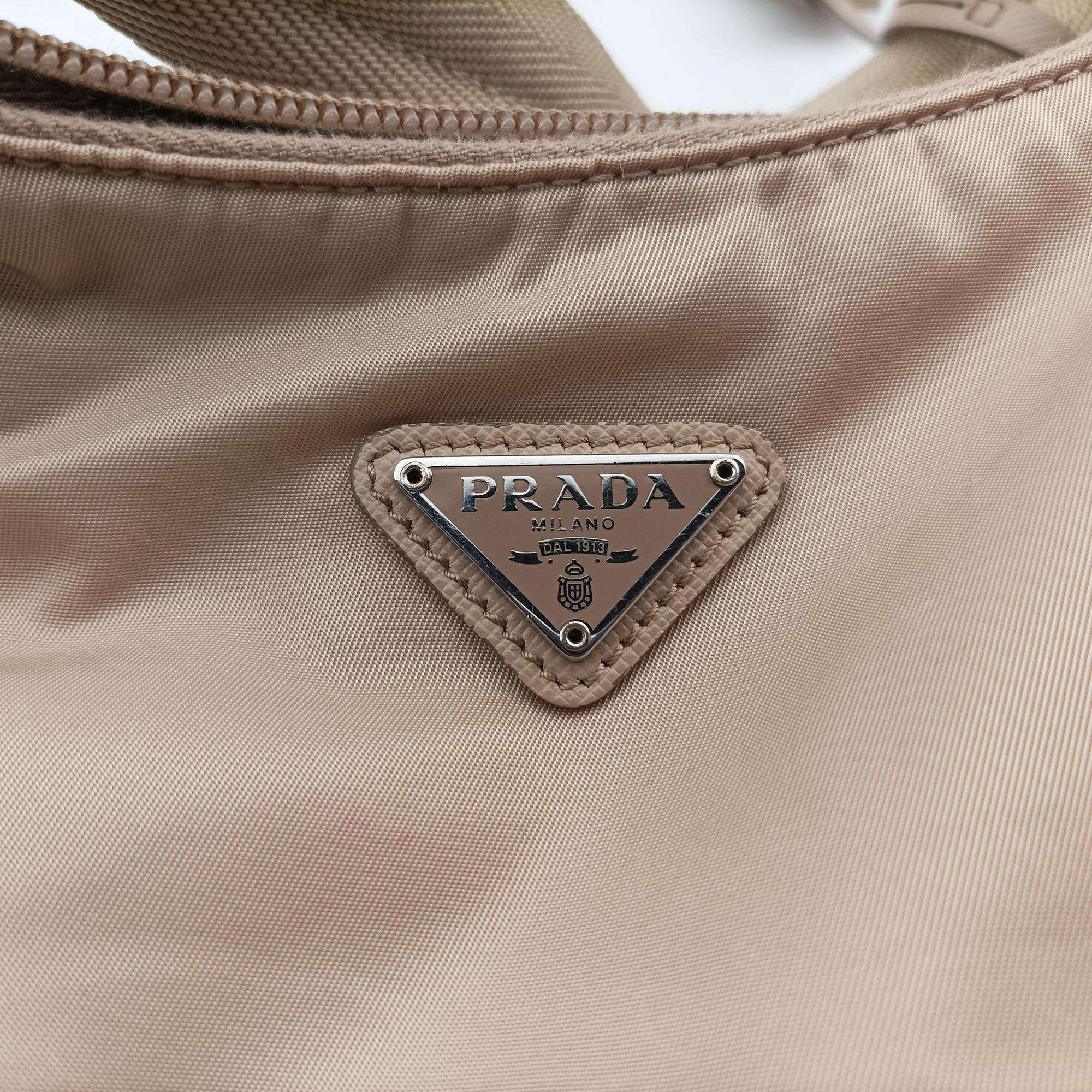 Pre-owned Prada Re-Edition 2005 Re-Nylon Bag Beige nylon 1BH204 handbag | stylenewstar