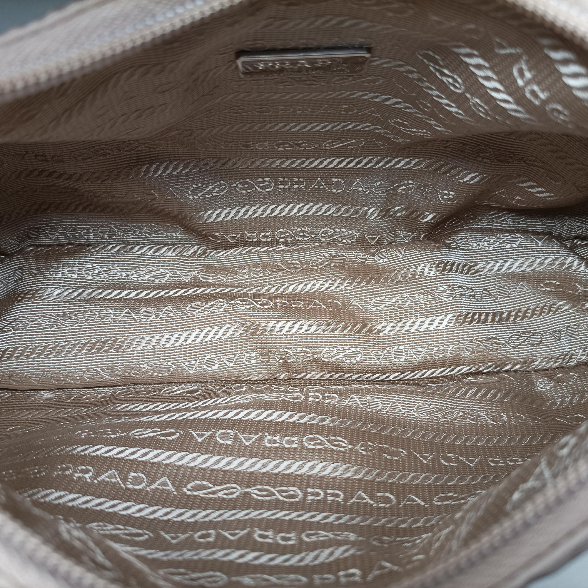 Pre-owned Prada Re-Edition 2005 Re-Nylon Bag Beige nylon 1BH204 handbag | stylenewstar