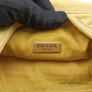 Secondhand Prada Re-Edition2000 Yellow nylon 1NE515 handbag | stylenewstar